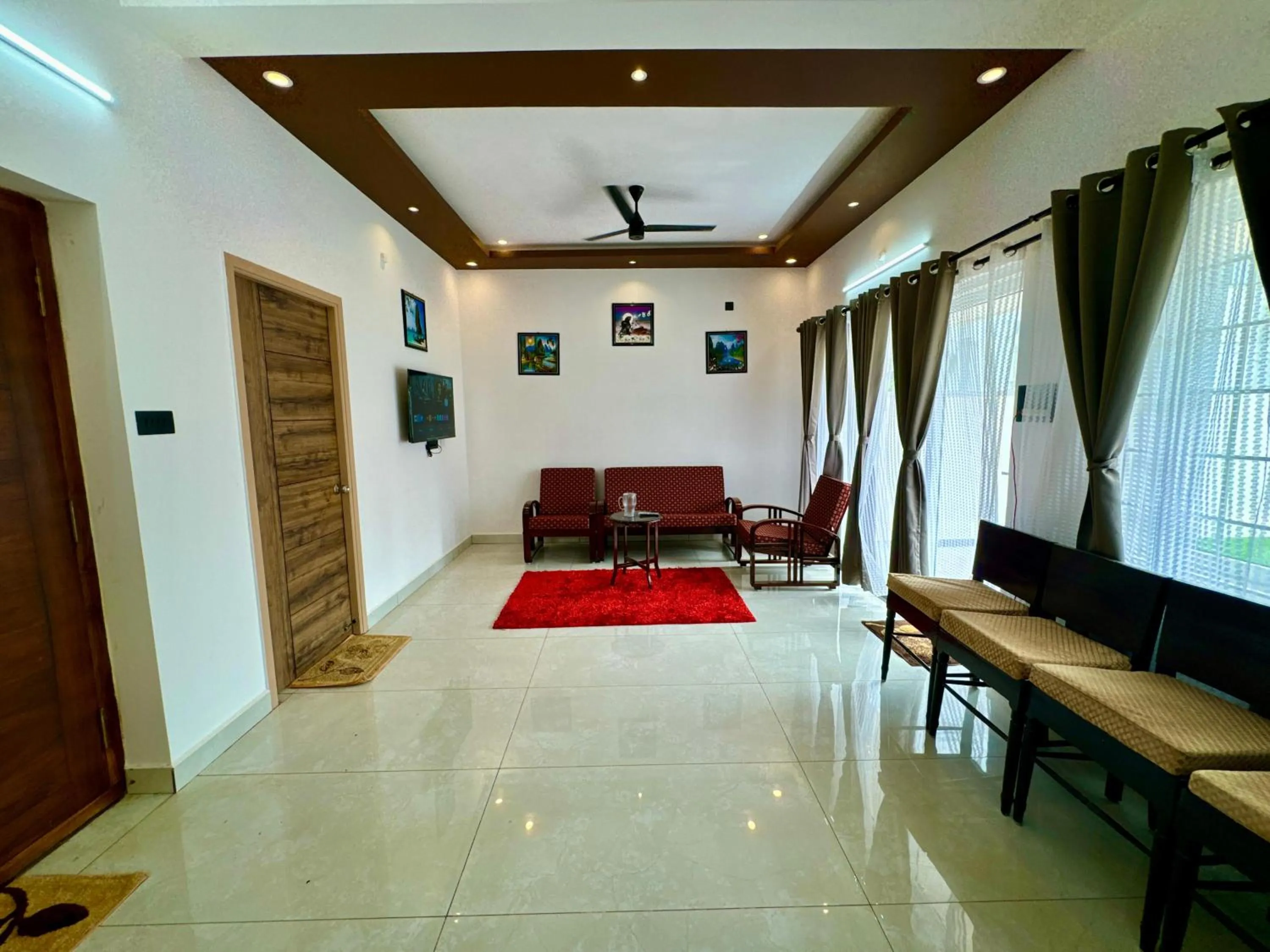 Living room in ECR Holidays Lavish Homestay