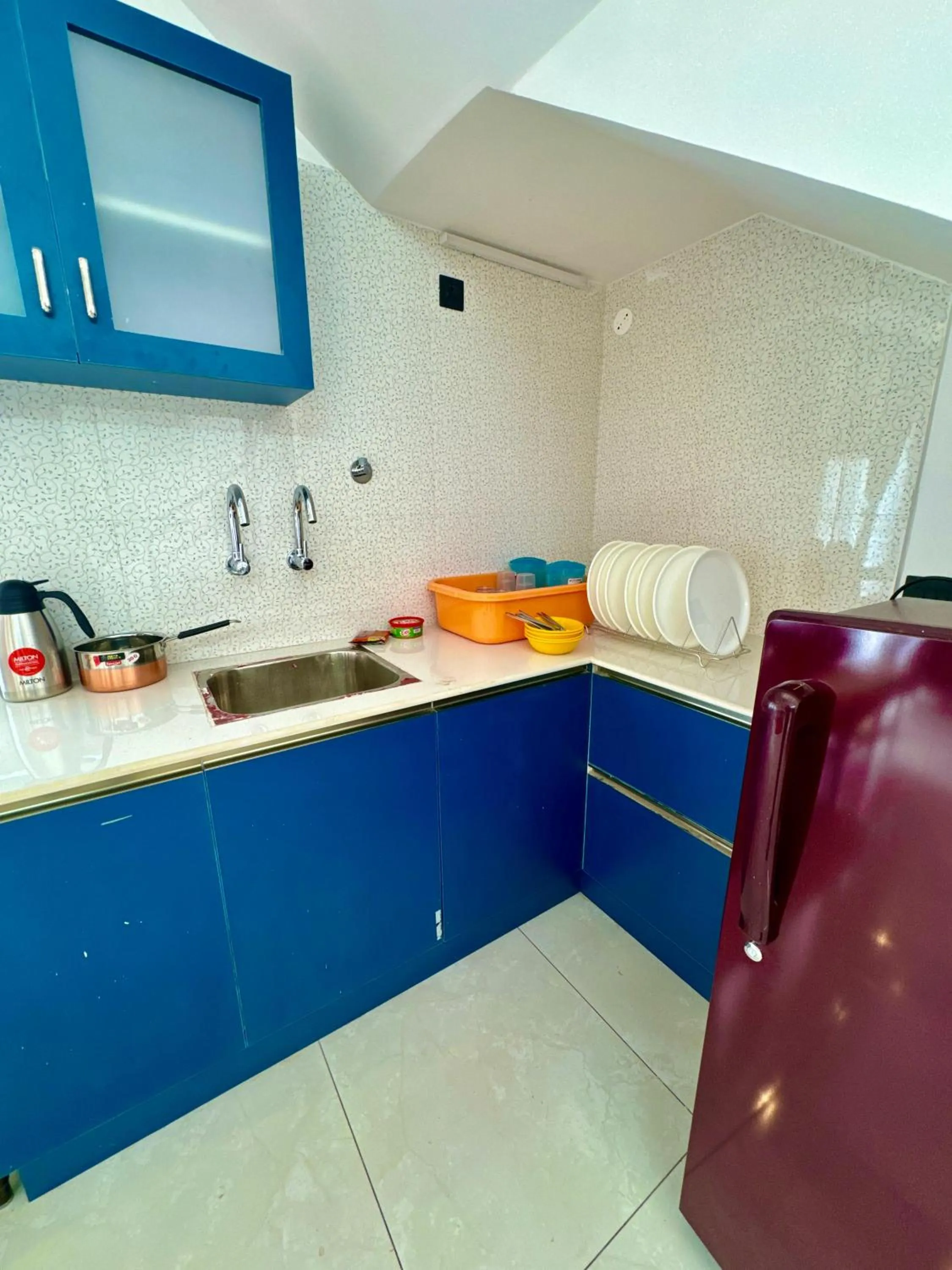 Kitchen or kitchenette in ECR Holidays Lavish Homestay