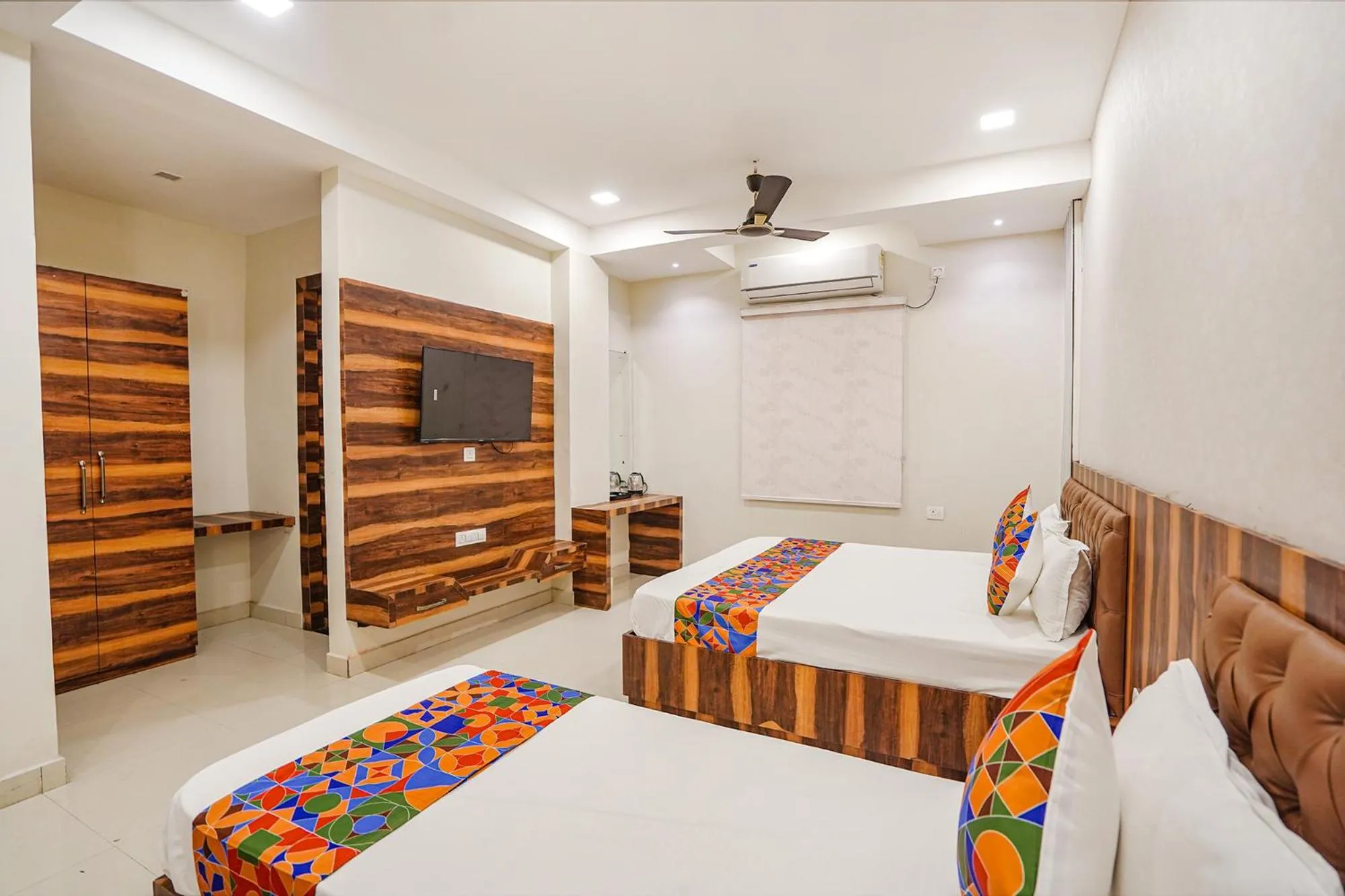 Bed in FabHotel TS Inn