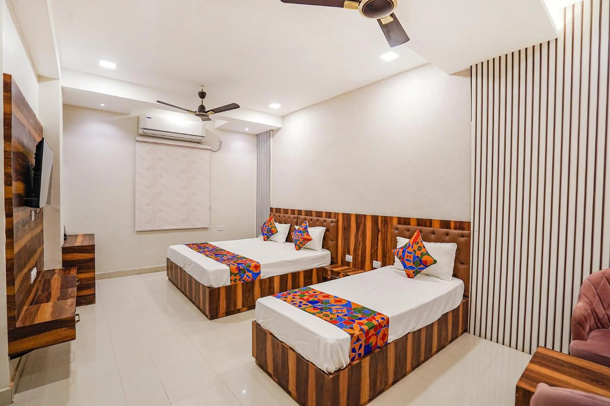 Bed in FabHotel TS Inn