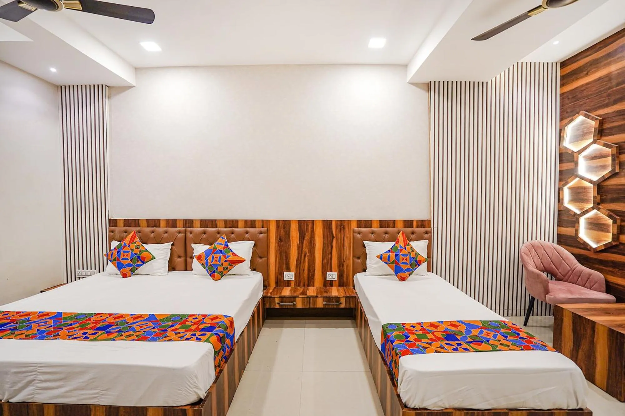 Bed in FabHotel TS Inn