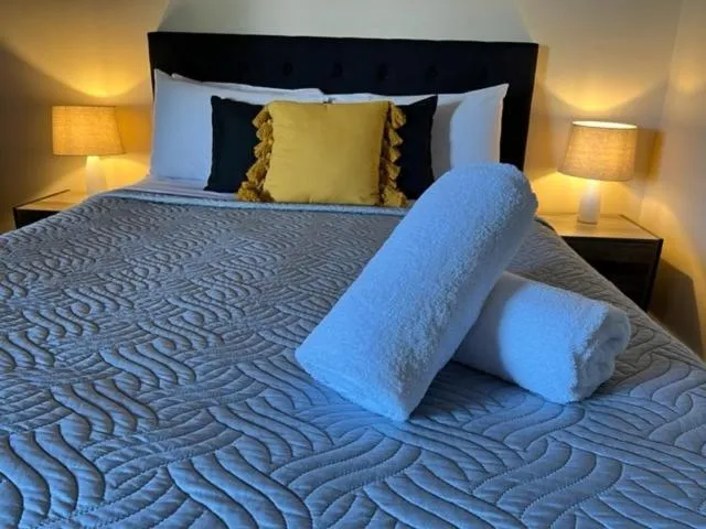 Bed in Jackie Howe Motel