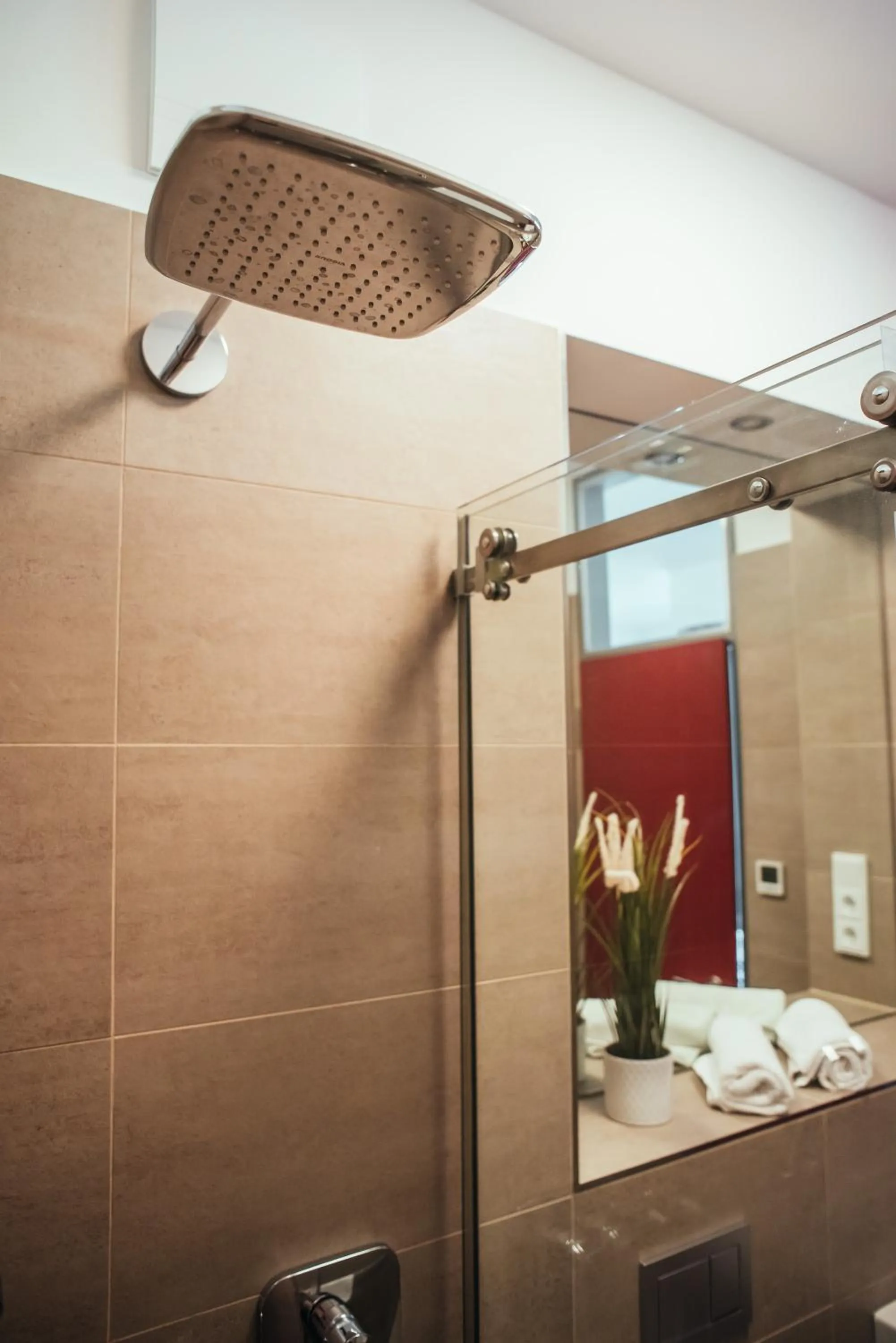 Shower in The Rix Studios & Suites