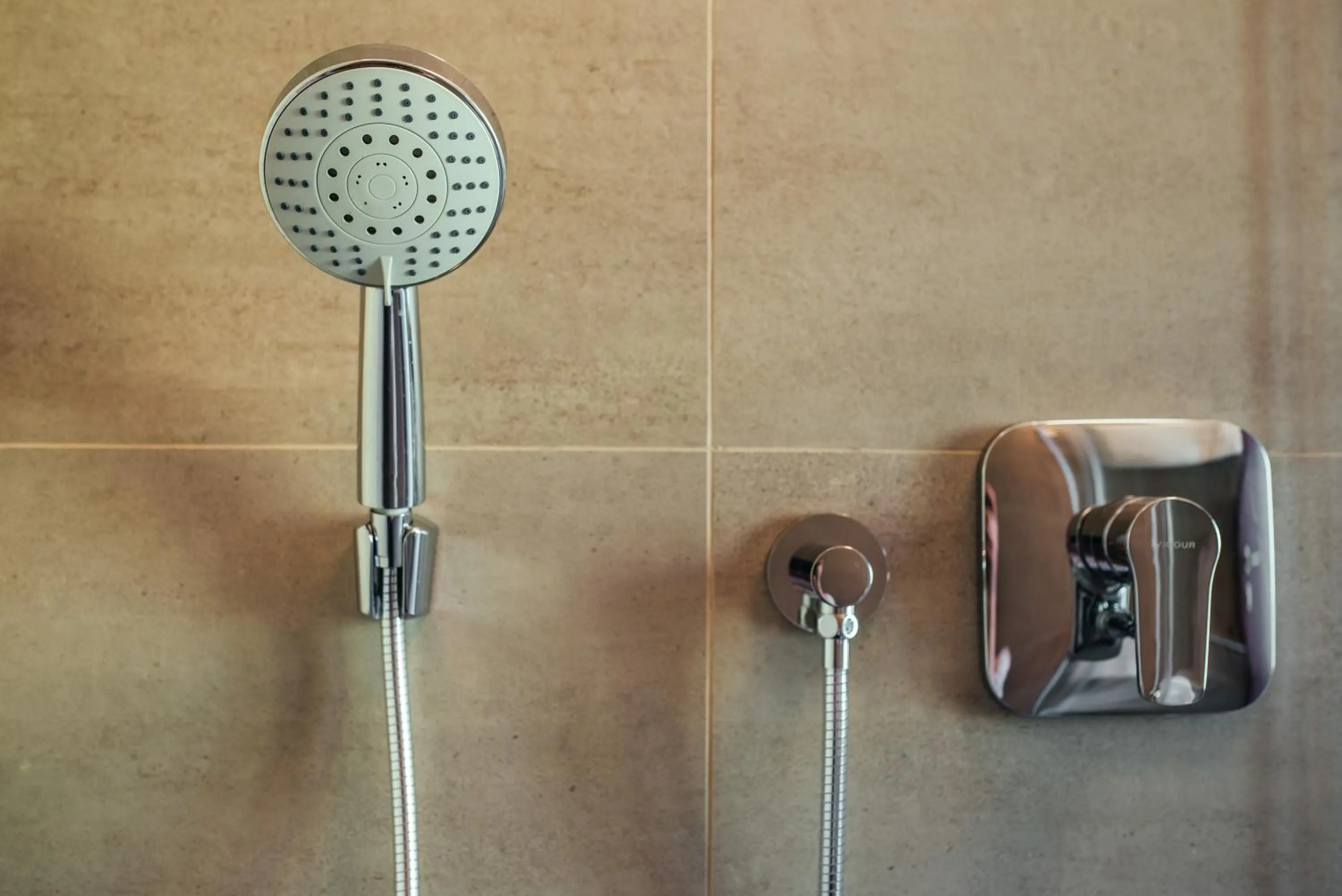 Shower in The Rix Studios & Suites