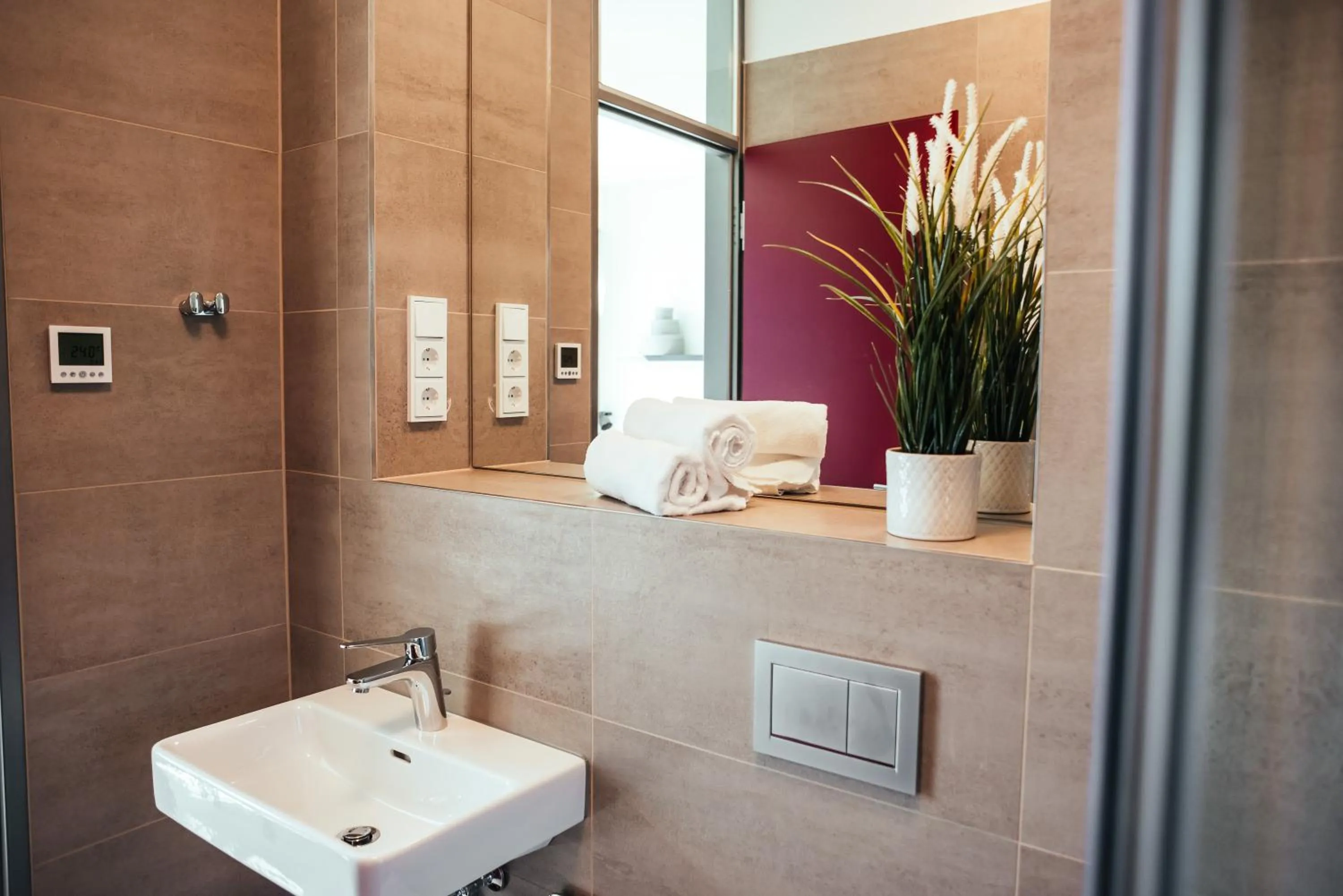 Shower in The Rix Studios & Suites