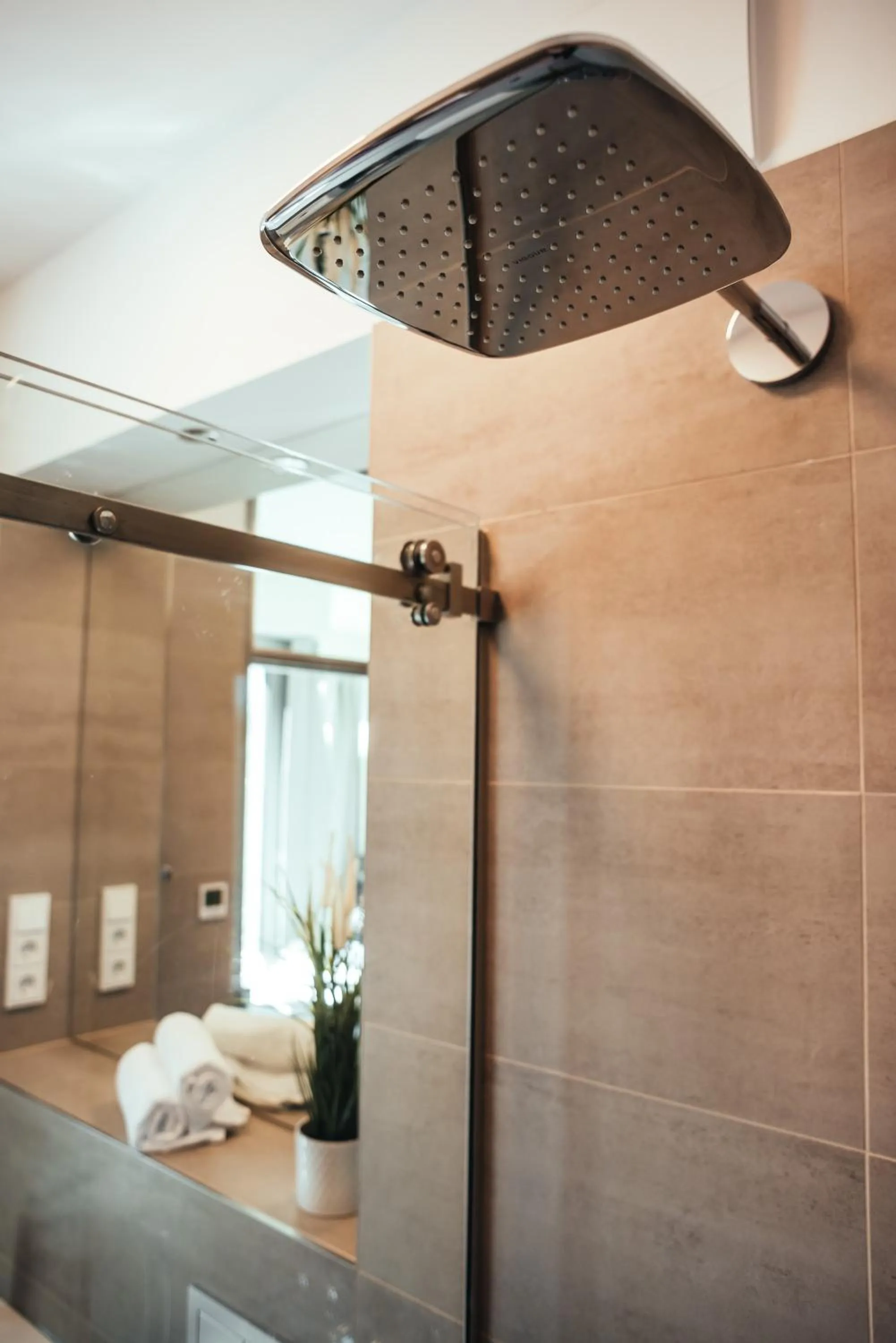 Shower in The Rix Studios & Suites