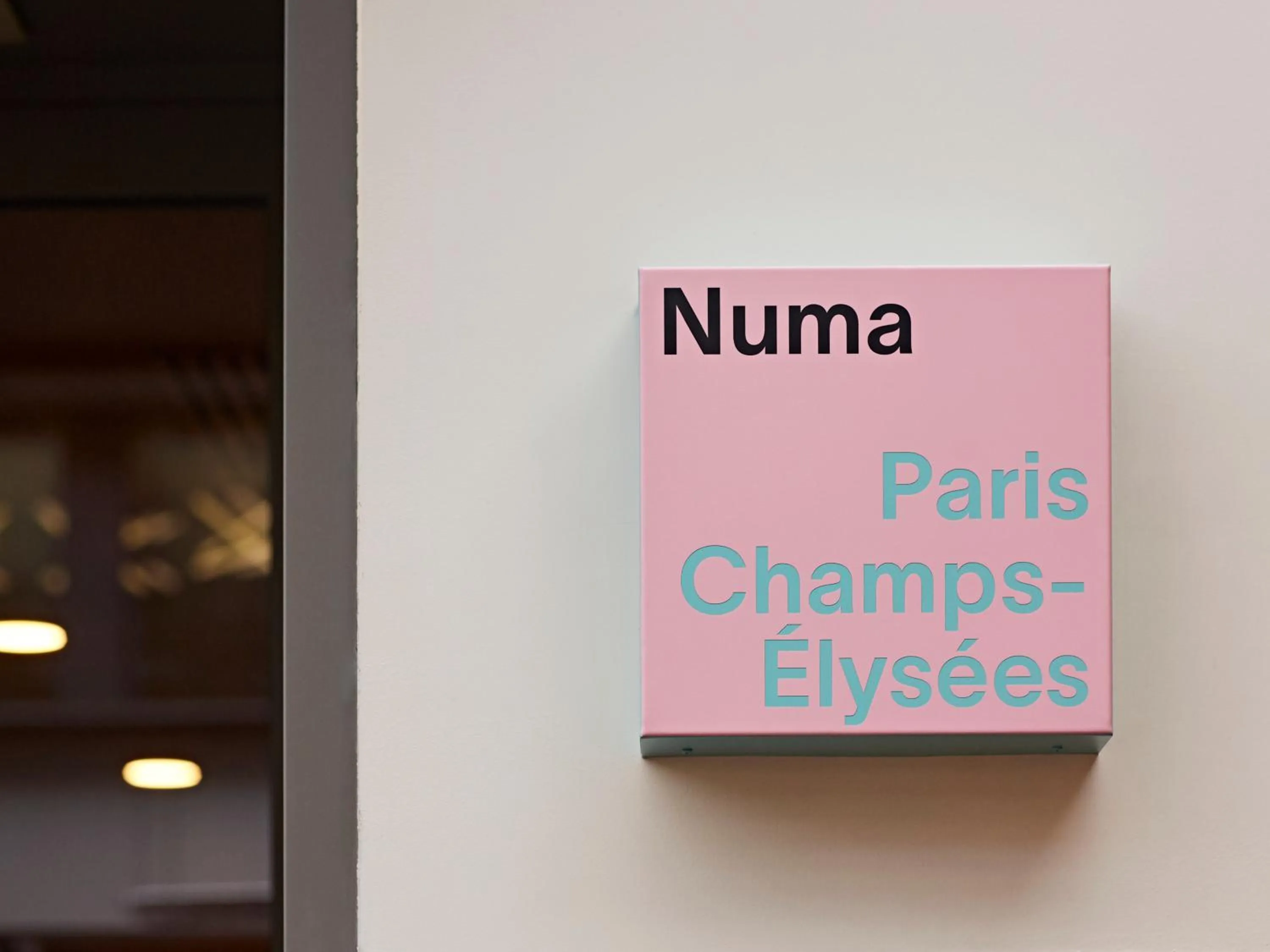 Property logo or sign in Numa Paris Champs-Élysées