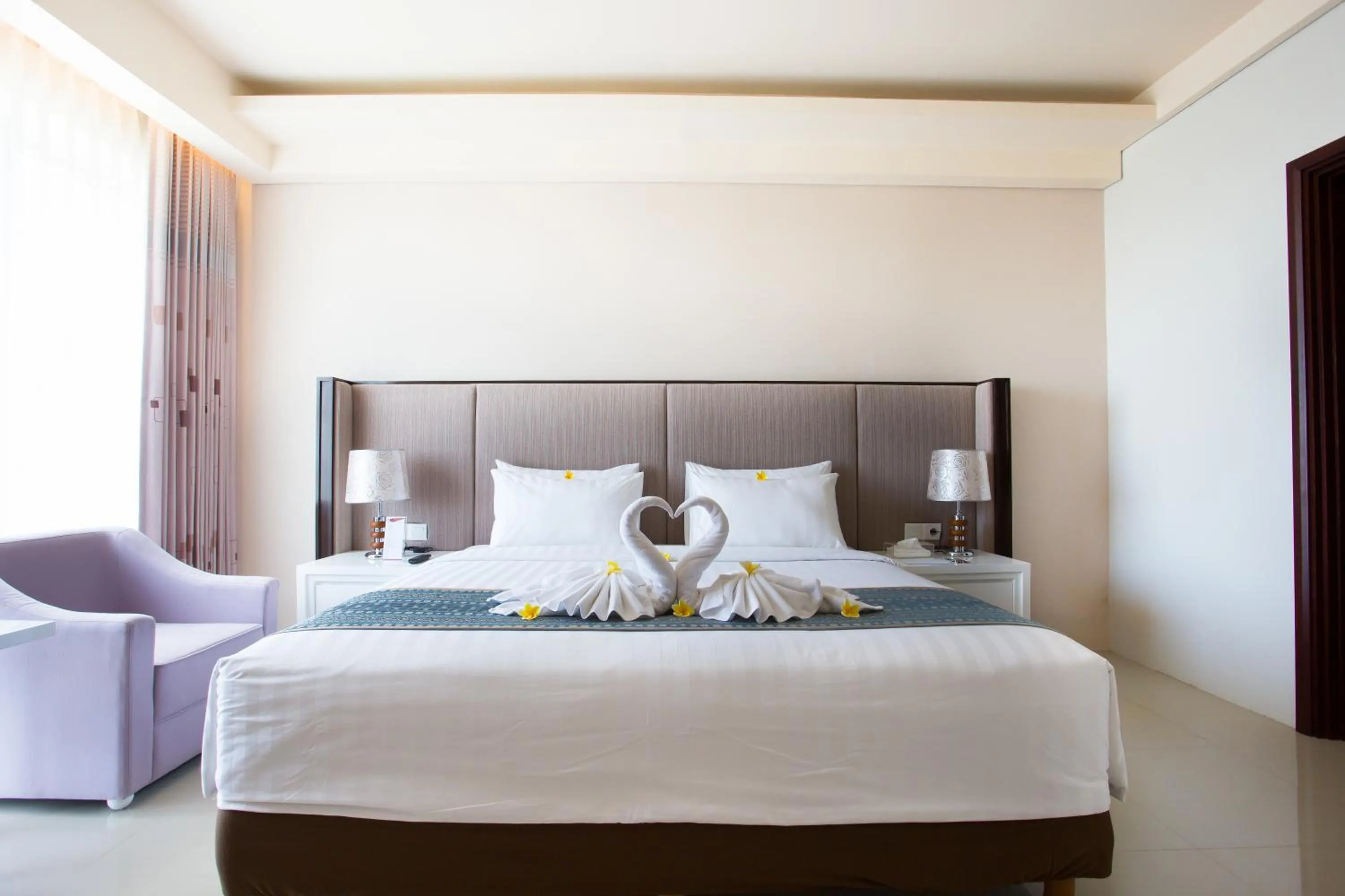 Photo of the whole room, Bed in Golden Palace Hotel Lombok