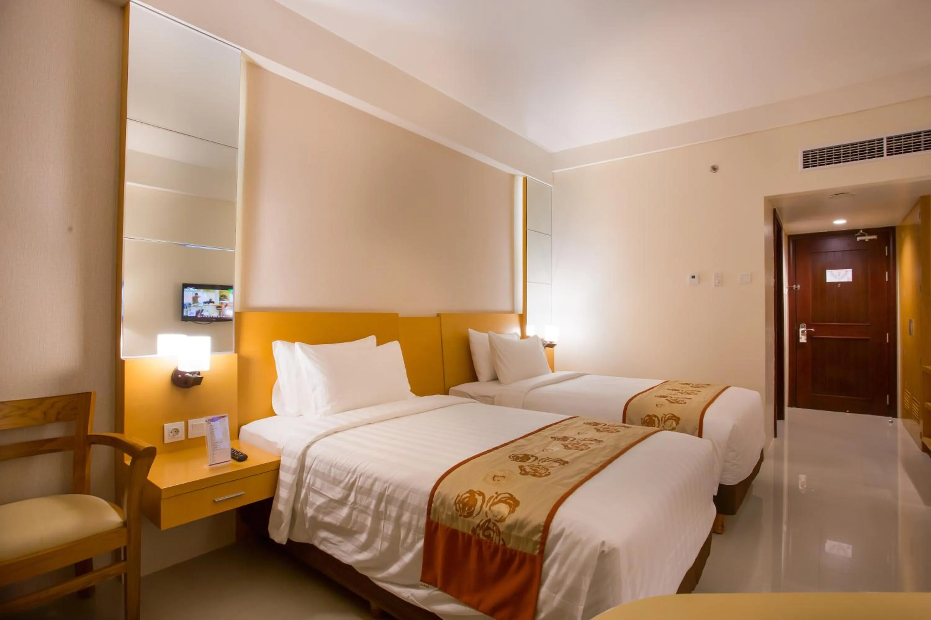 Photo of the whole room, Bed in Golden Palace Hotel Lombok