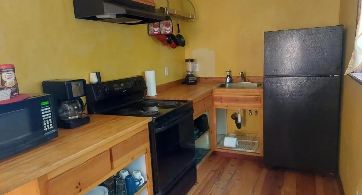 Kitchen or kitchenette in Sequoia River Front Cabins