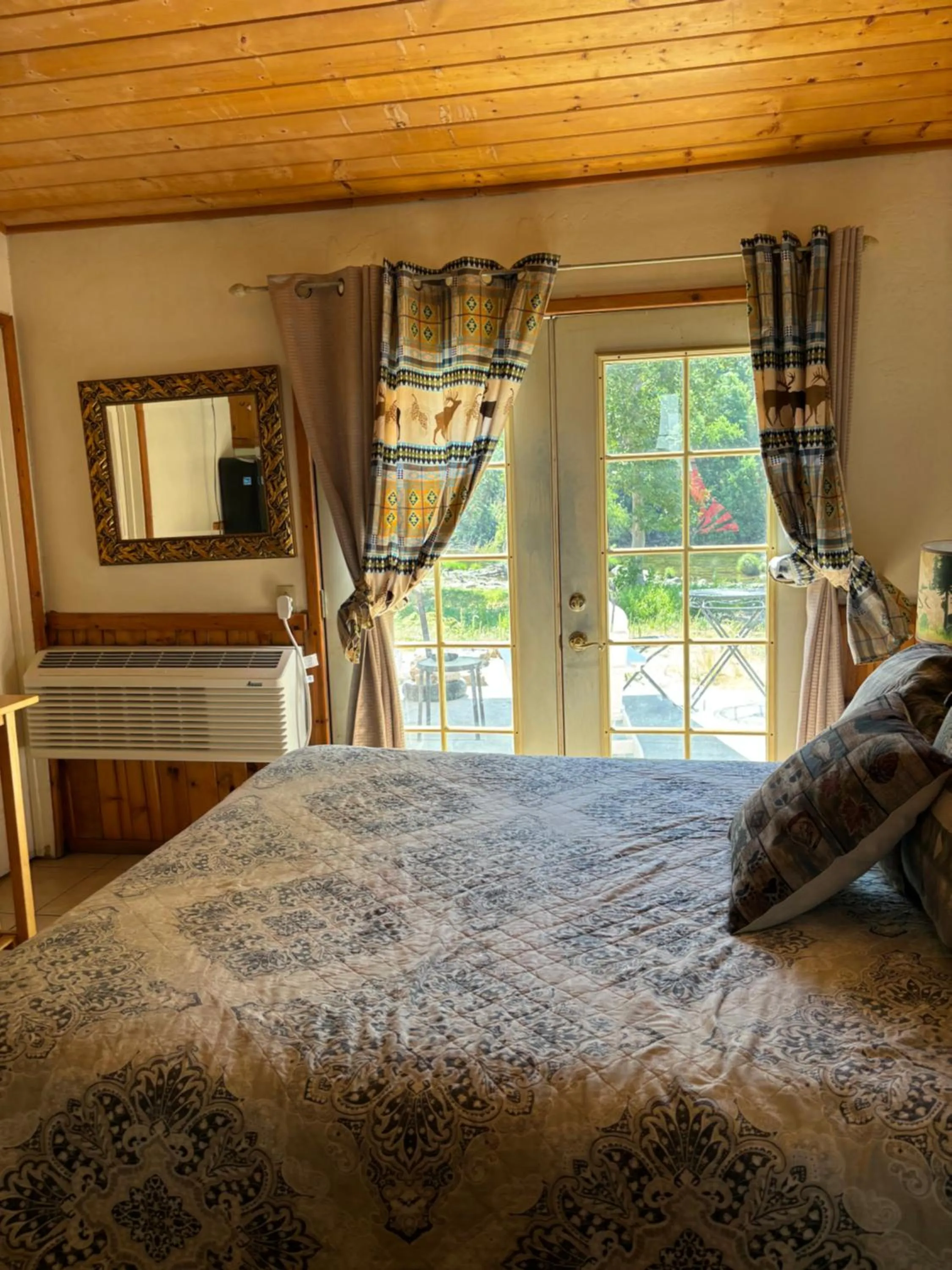 Photo of the whole room, Bed in Sequoia River Front Cabins