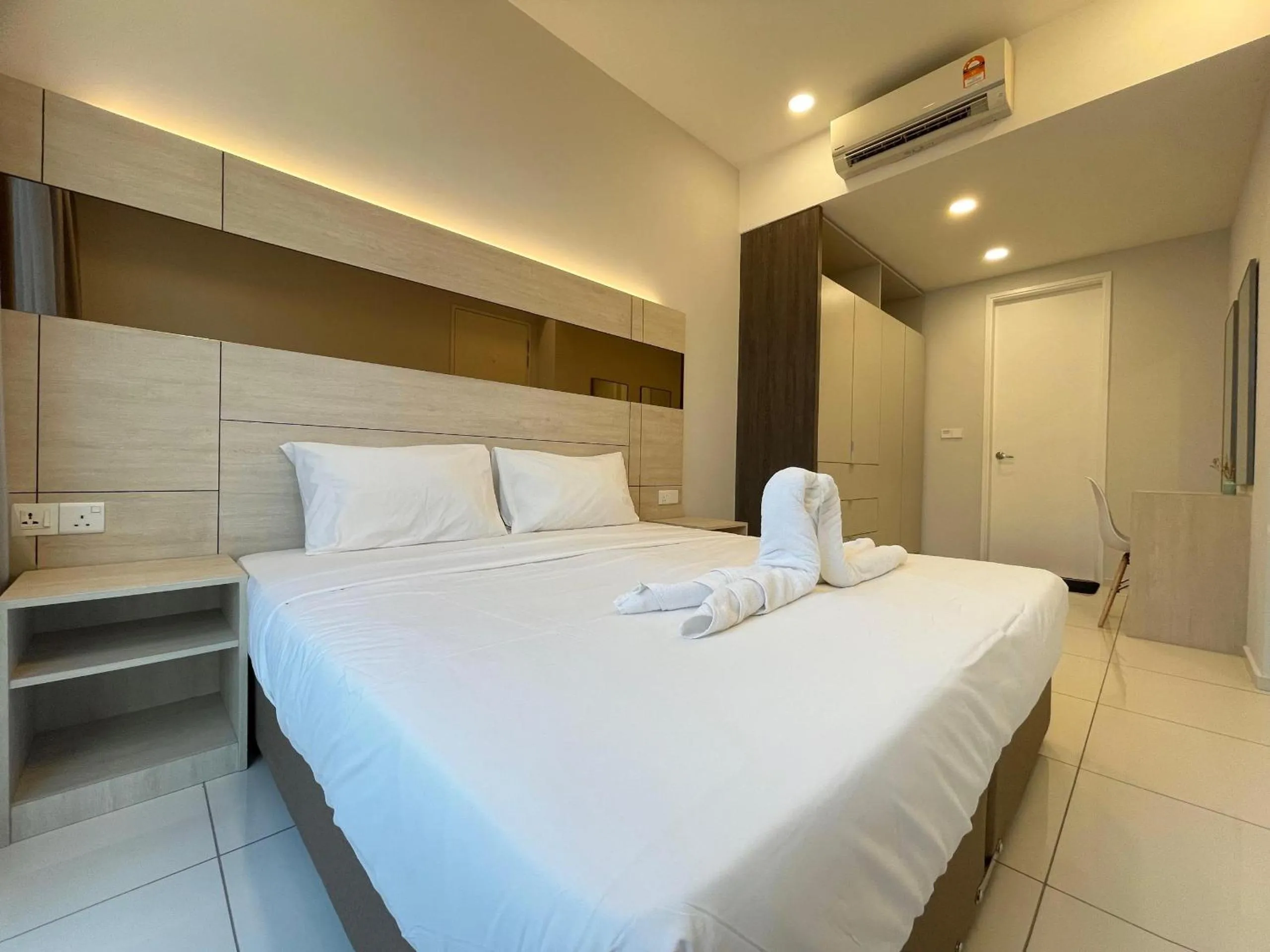 Bed in The Robertson-Bukit Bintang by PILLOWTALKS