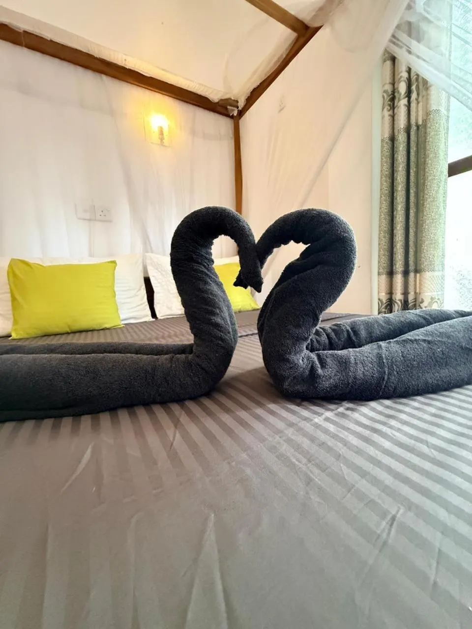 Bed in Pearl Deluna Resort Mirissa