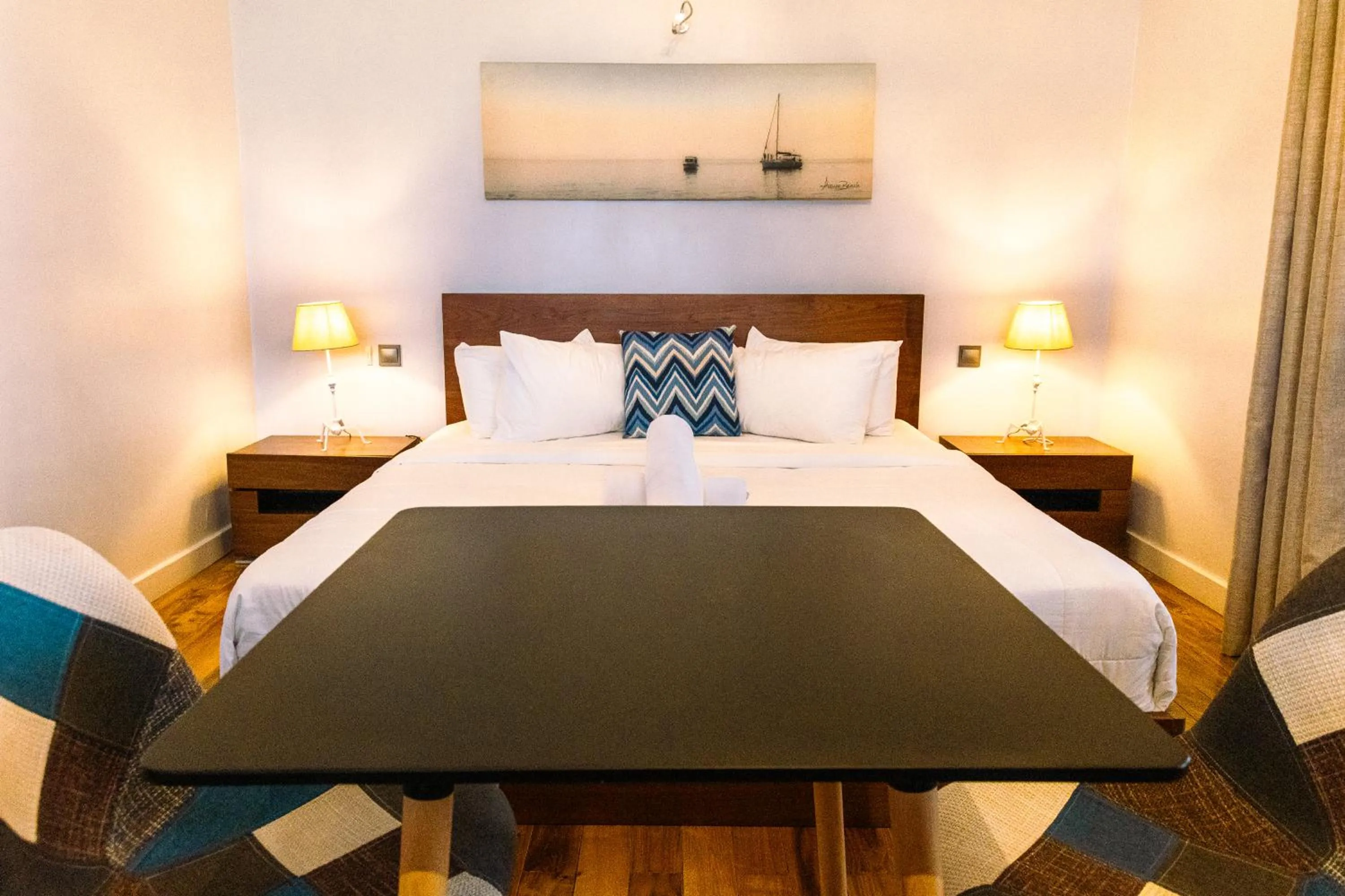 Bed in Azure Beach Boutique Hotel