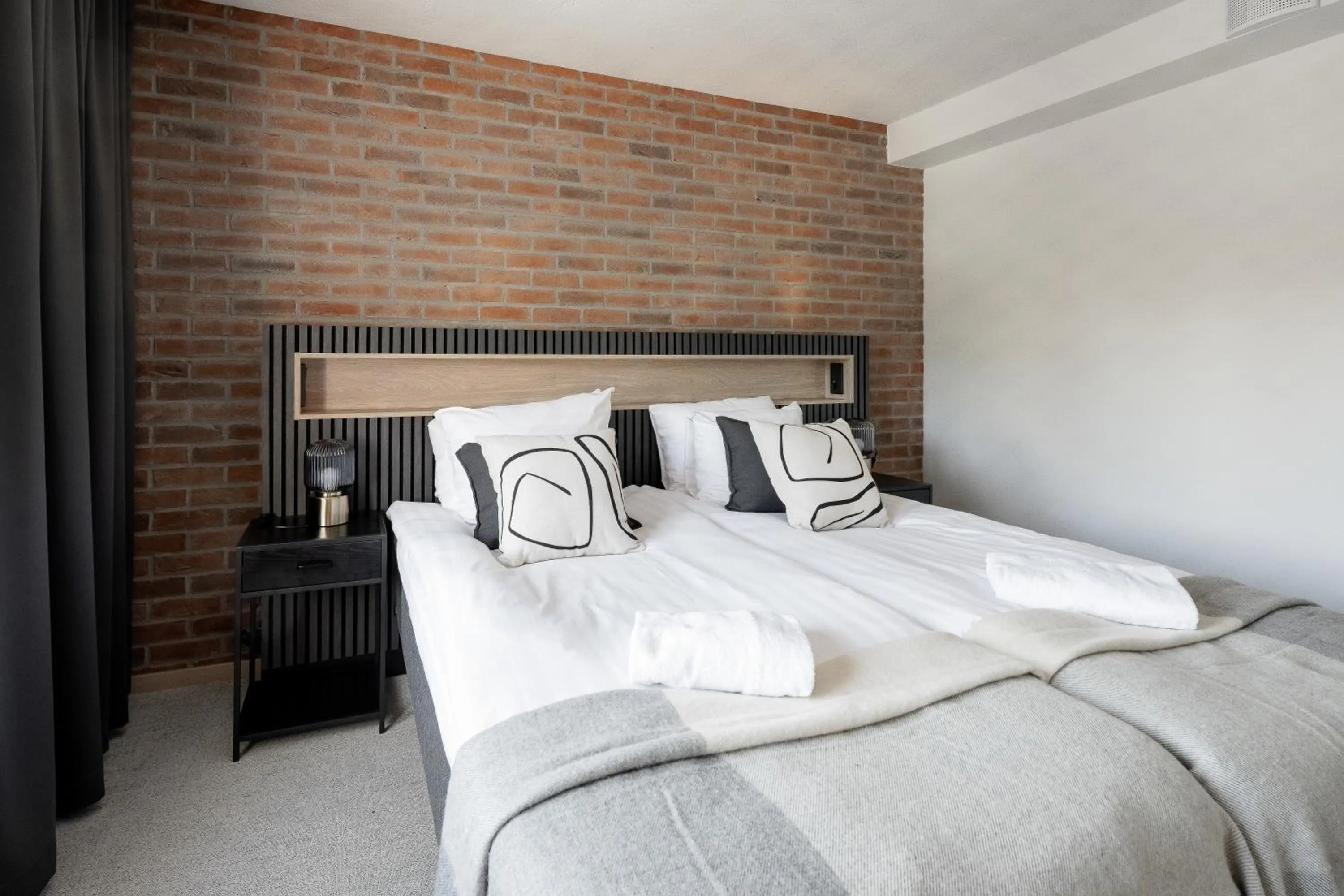 Bed in Frans & Frans - Hotel and Apartments by UHANDA