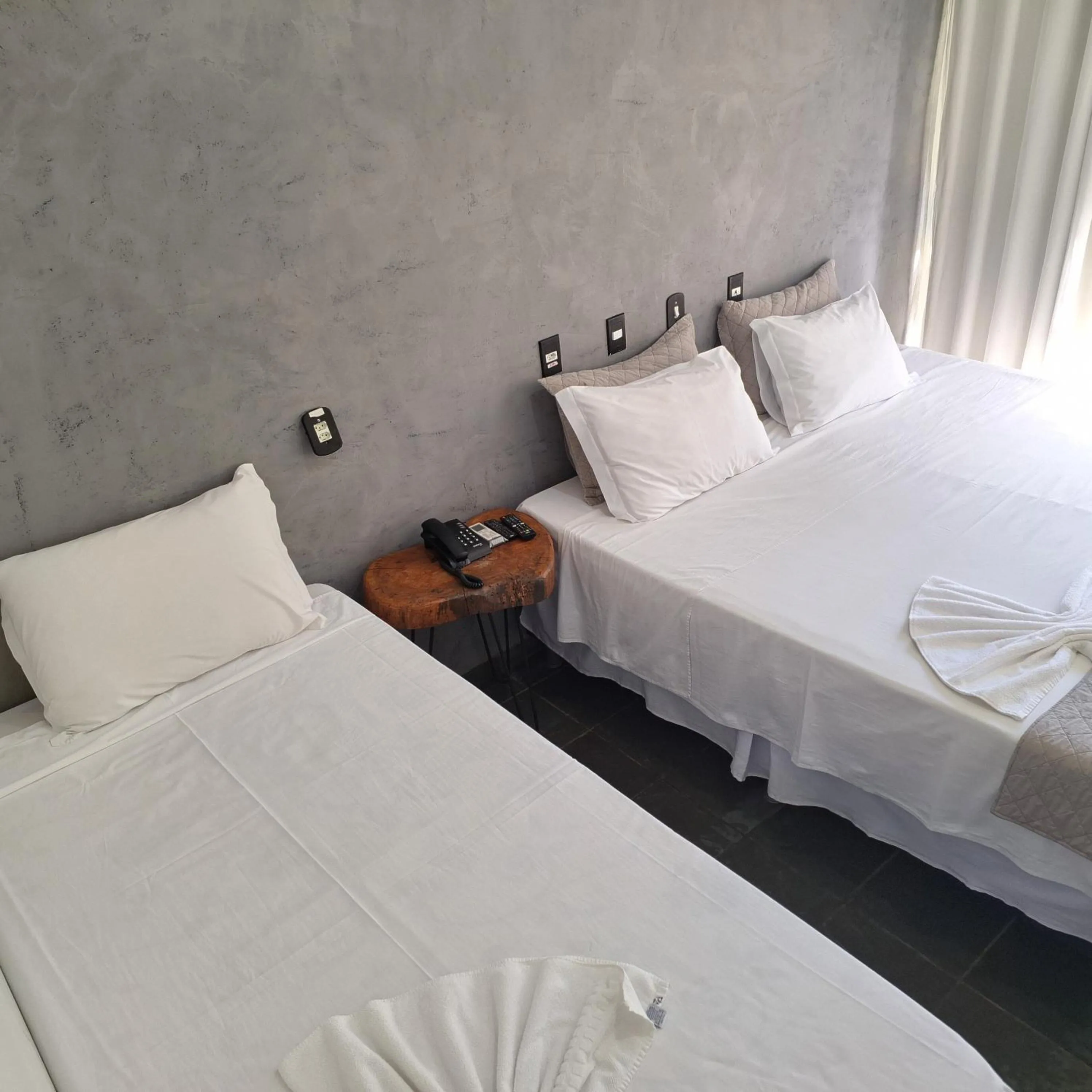 Bed in Pousada Sol do Araguaia