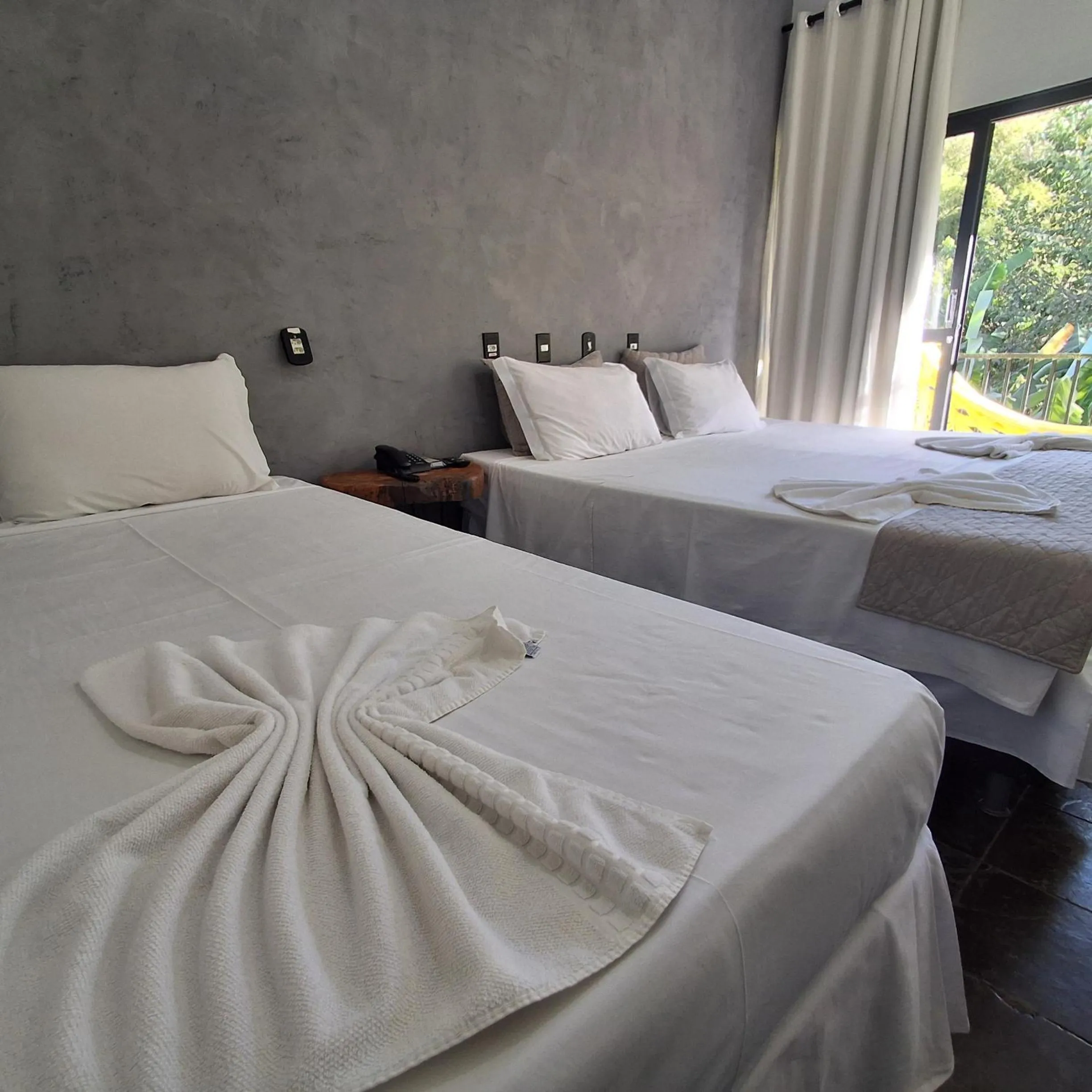 Bed in Pousada Sol do Araguaia