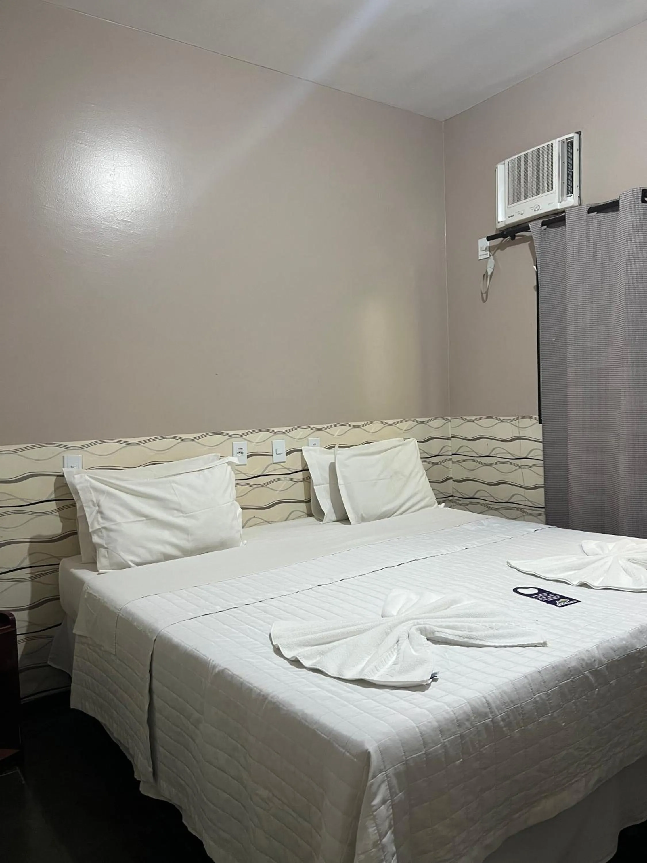 Bed in Pousada Sol do Araguaia