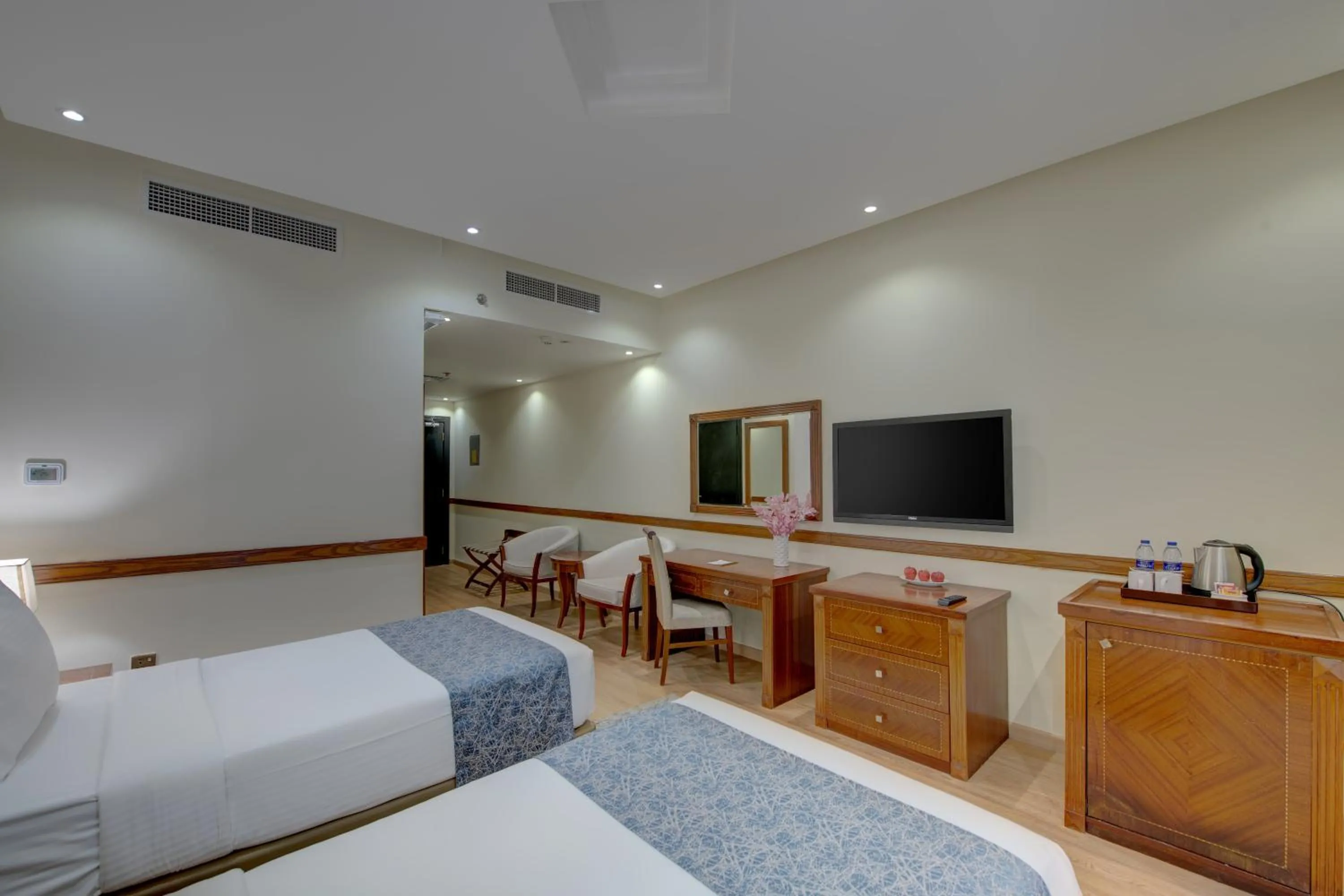 Bed in Vendome Plaza Hotel