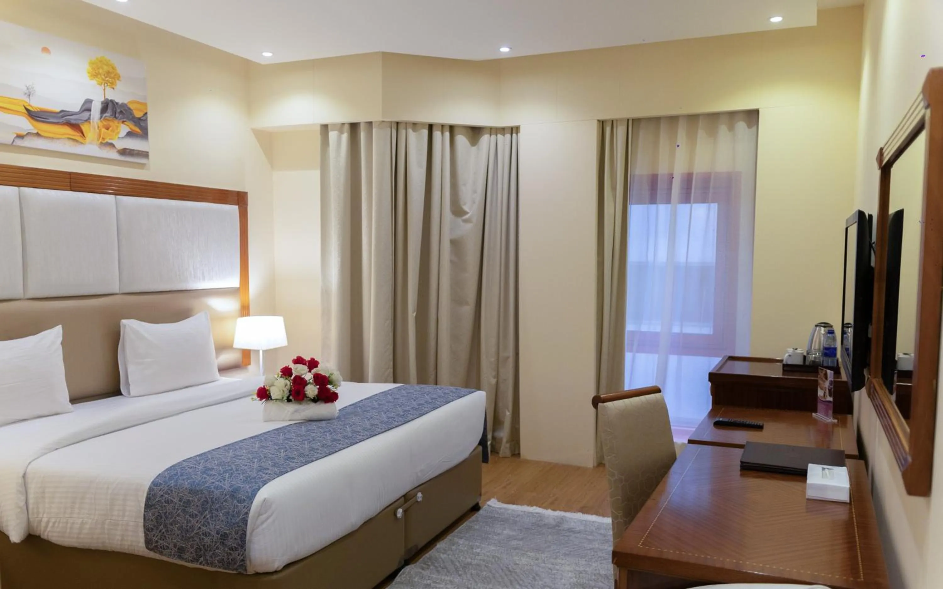 Bed in Vendome Plaza Hotel