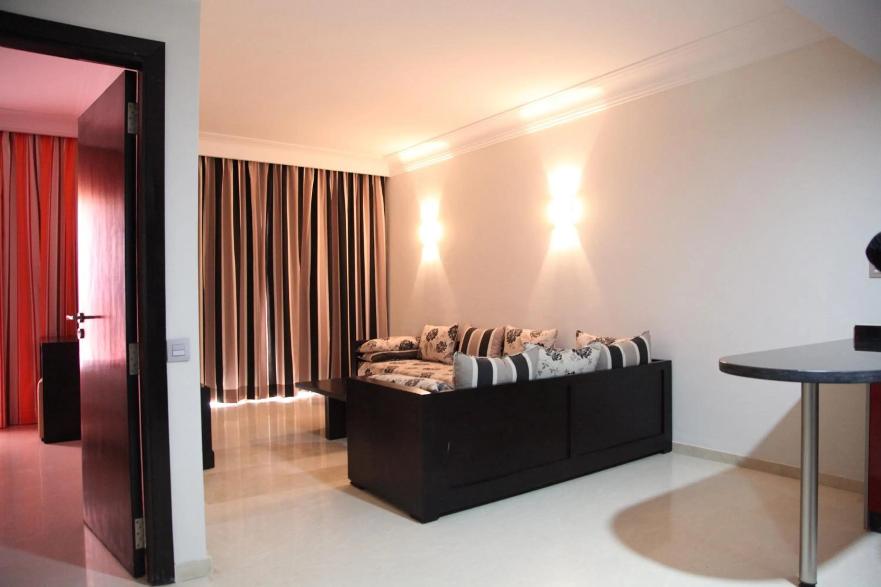 Seating area, Bed in Palm Appart Hôtel Marrakech