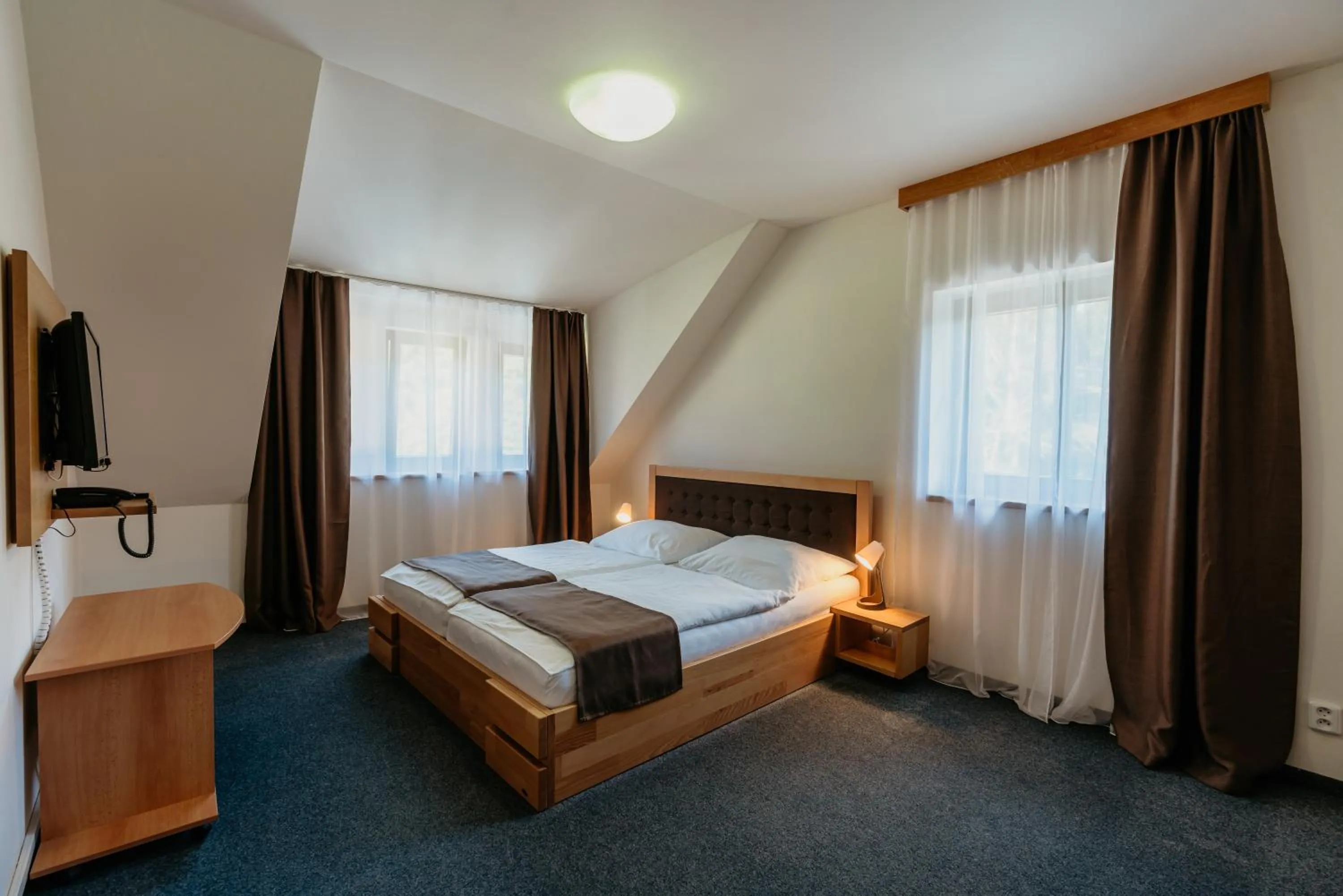 Bed in Amantis Vital Sport Hotel