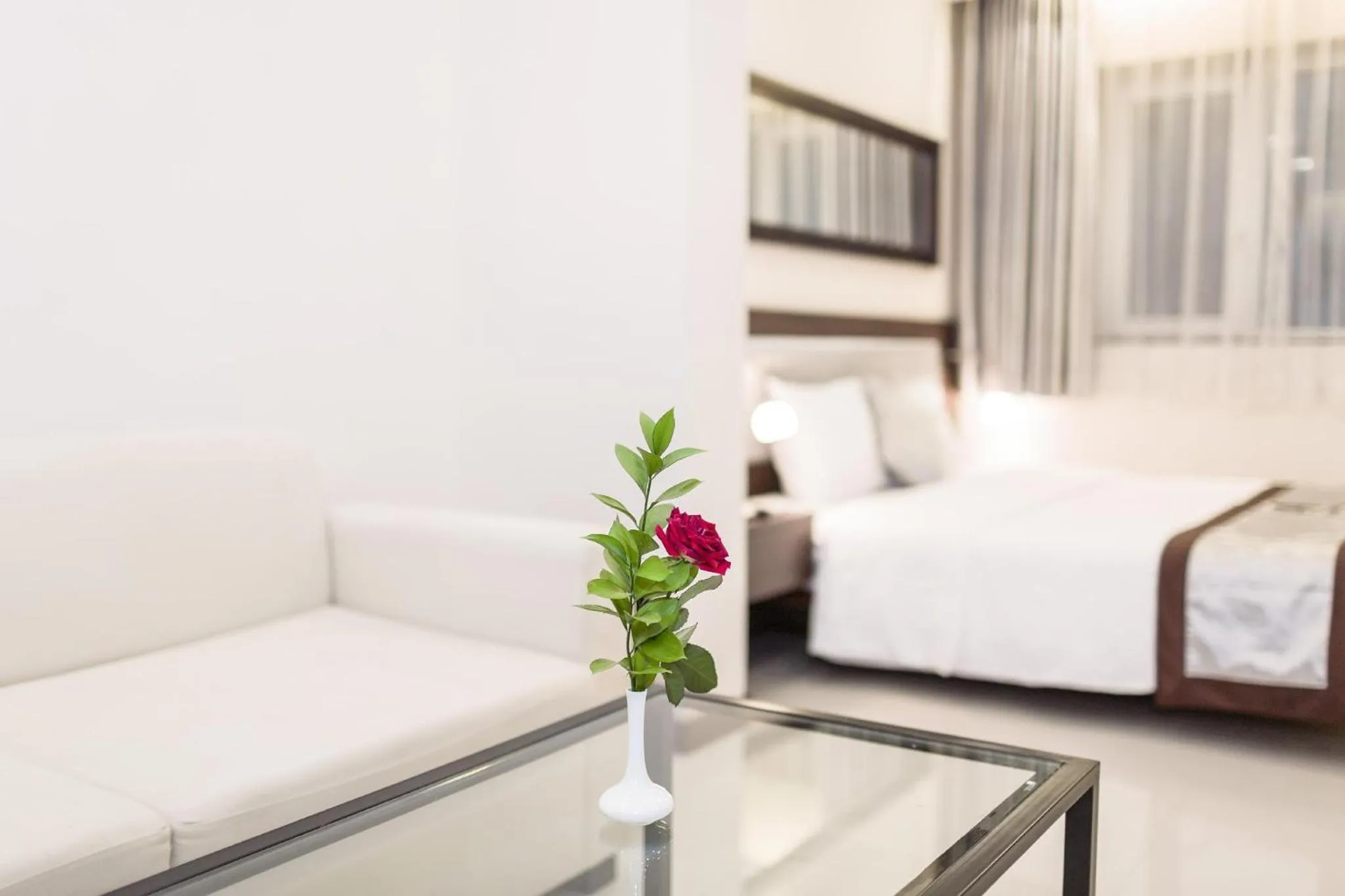 Living room, Bed in Hong Ha HOTEL