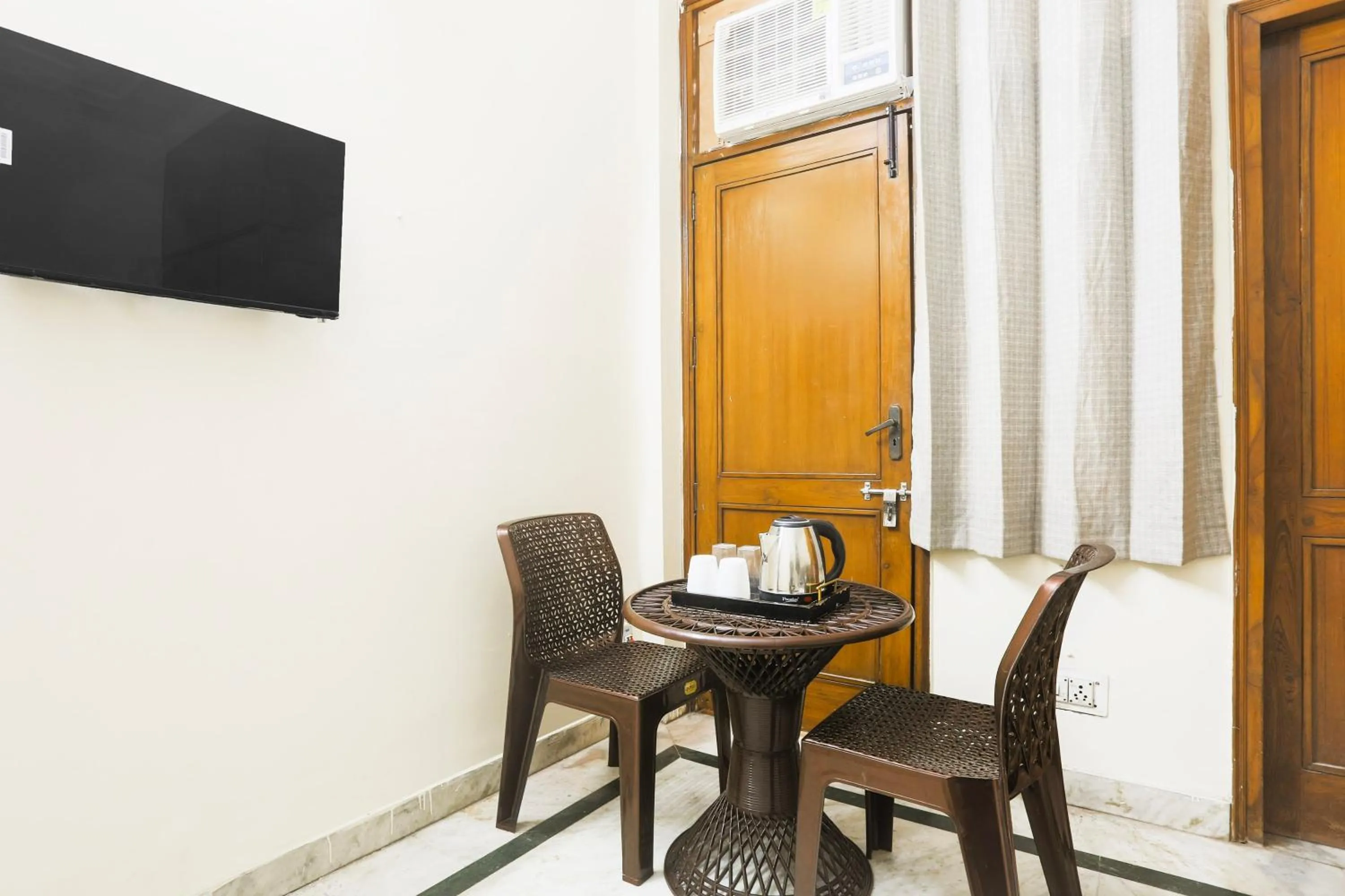 Bedroom in Hotel O JPS DC RESIDENCY