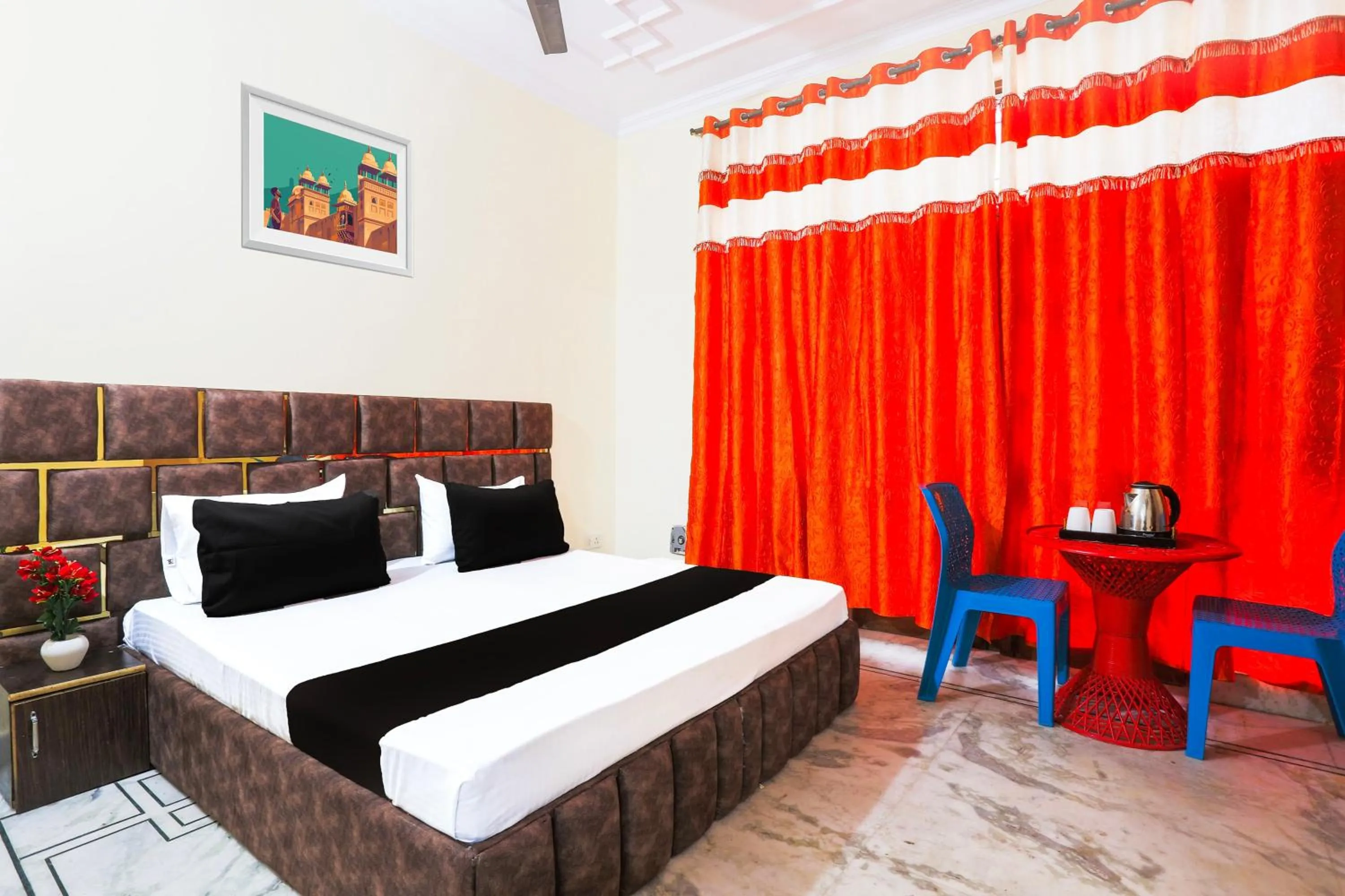 Bedroom in Hotel O JPS DC RESIDENCY