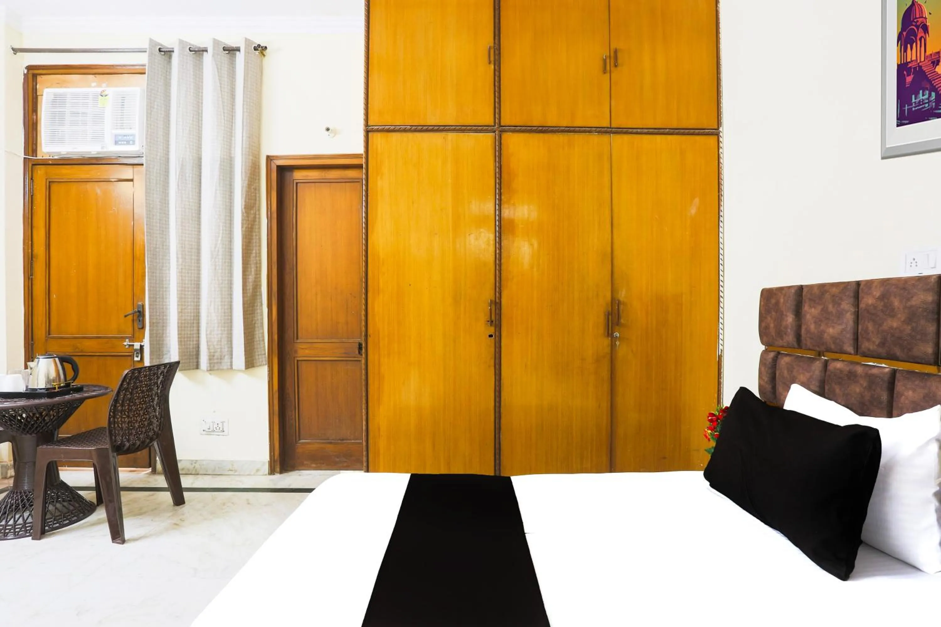 Bedroom in Hotel O JPS DC RESIDENCY