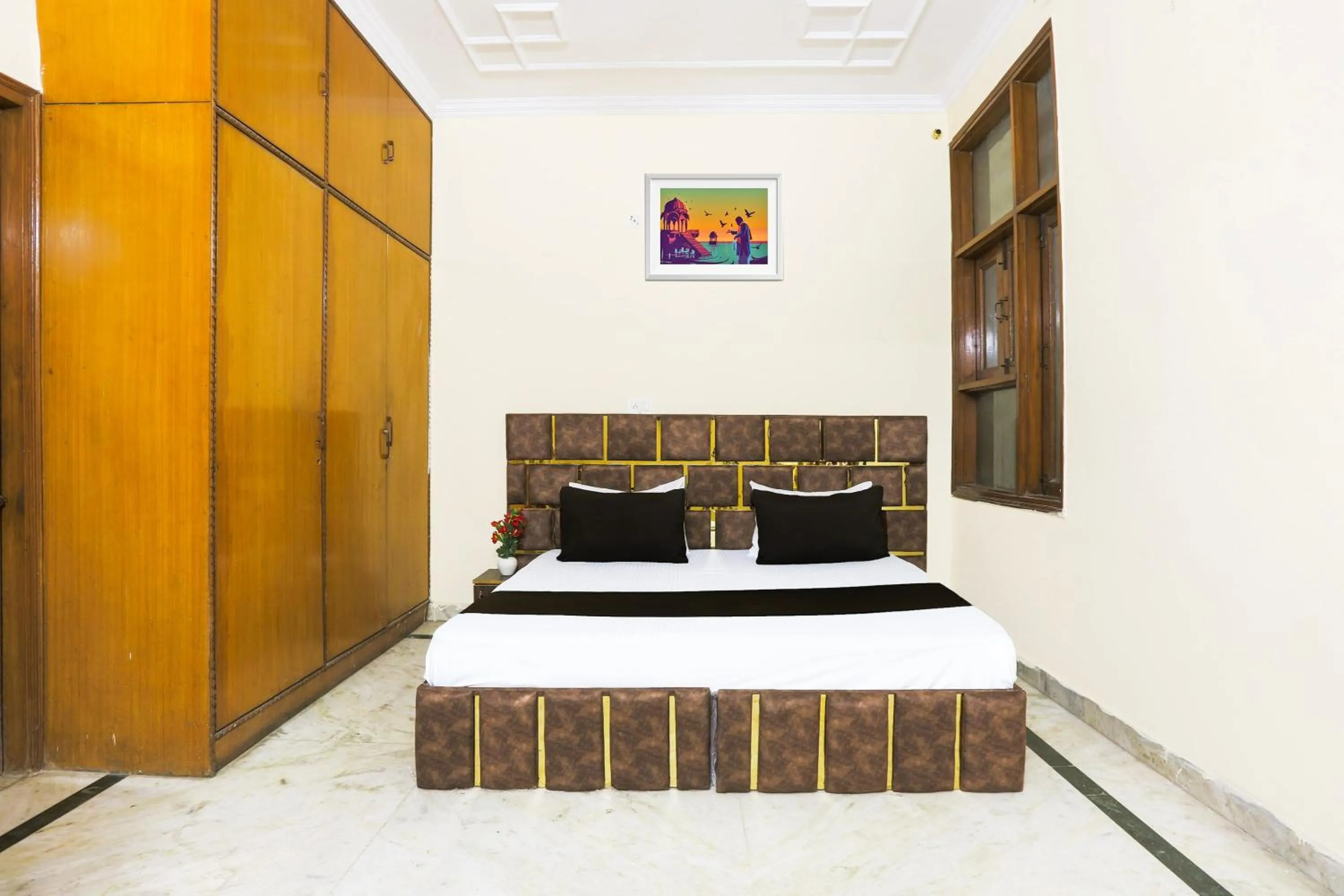 Bedroom in Hotel O JPS DC RESIDENCY