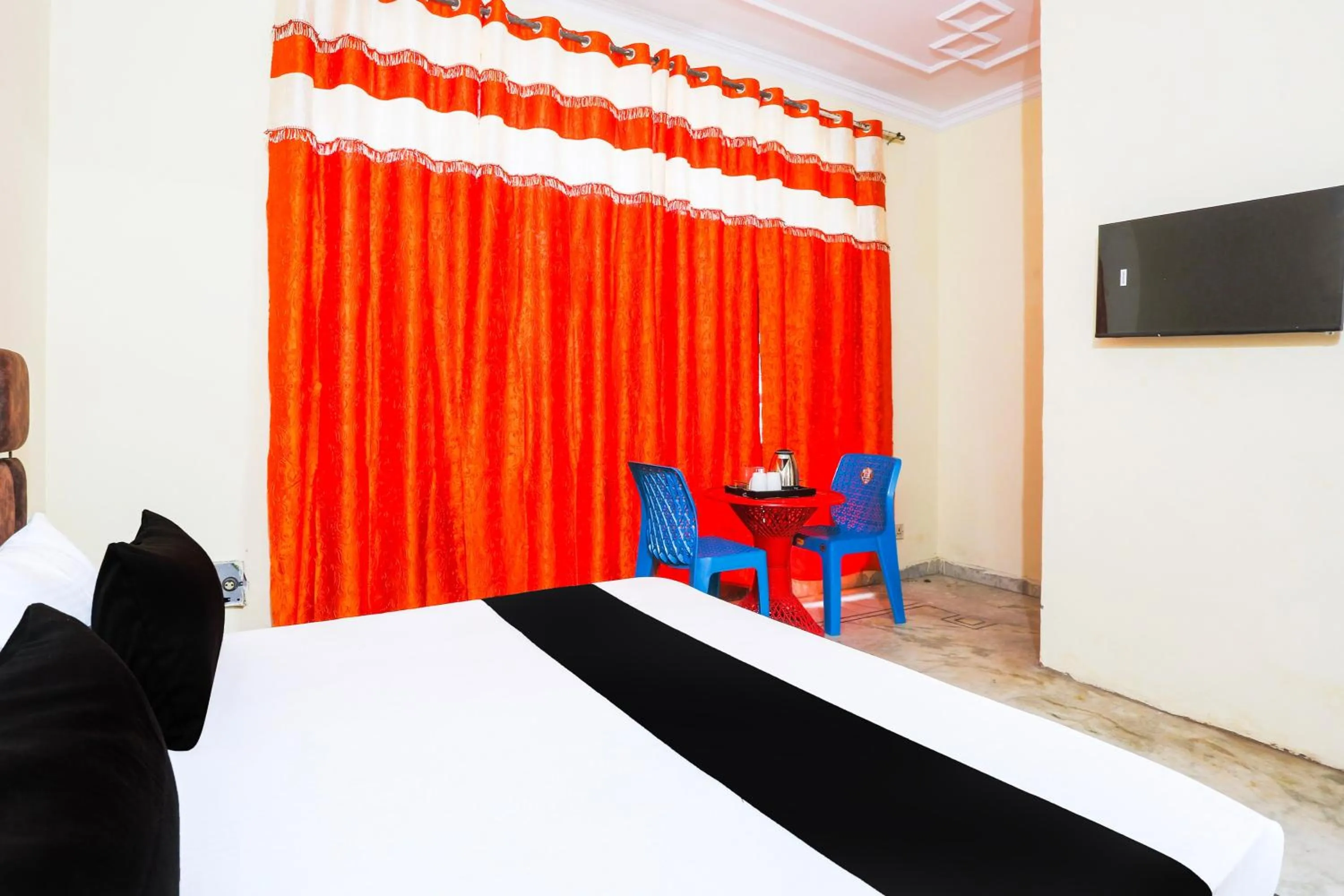 Bedroom in Hotel O JPS DC RESIDENCY
