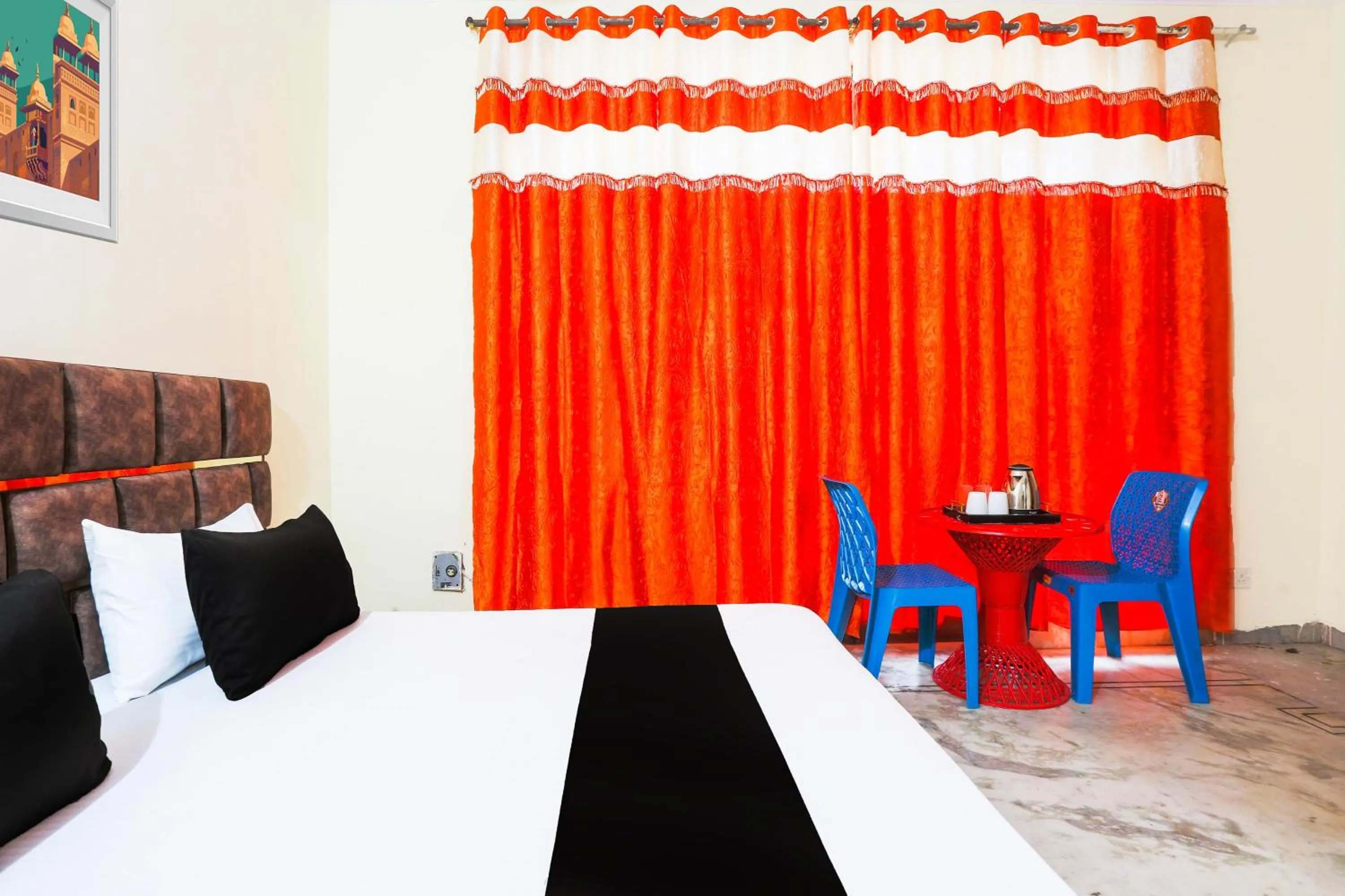 Bedroom in Hotel O JPS DC RESIDENCY