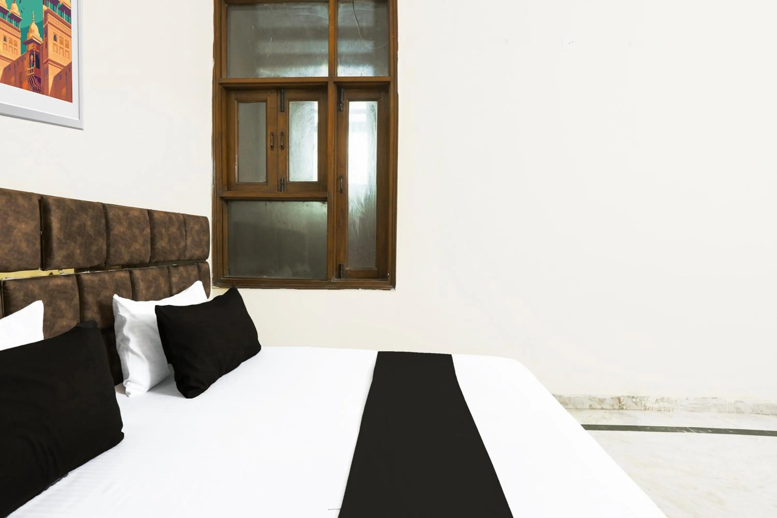 Bedroom in Hotel O JPS DC RESIDENCY