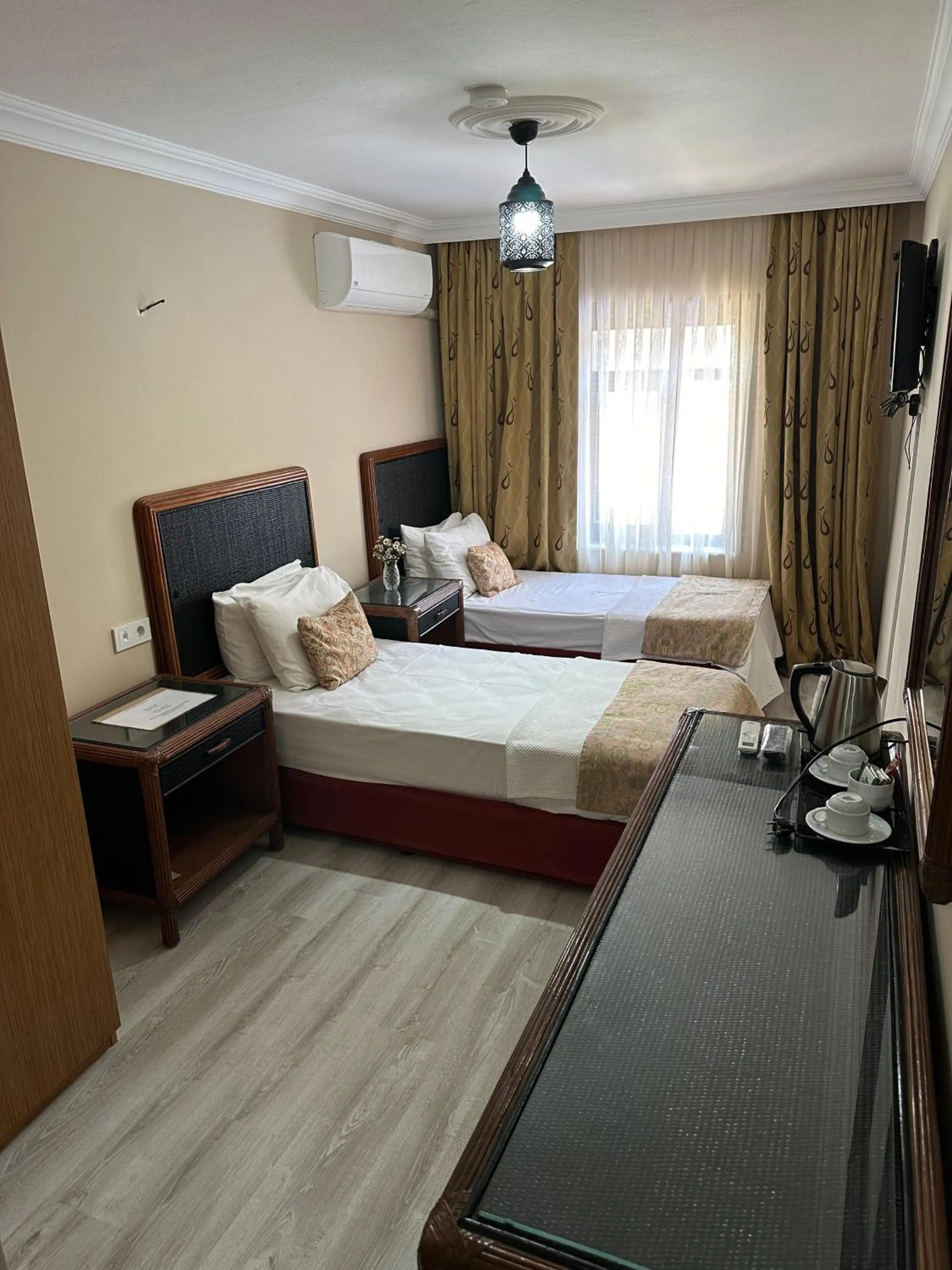 Bed in Loost Town Inn Hotel