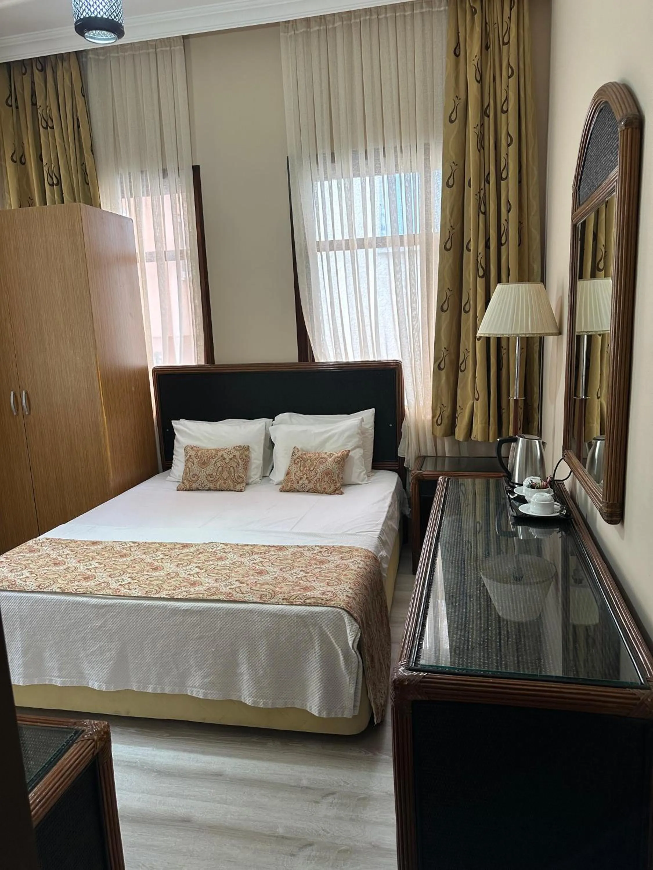 Bed in Loost Town Inn Hotel