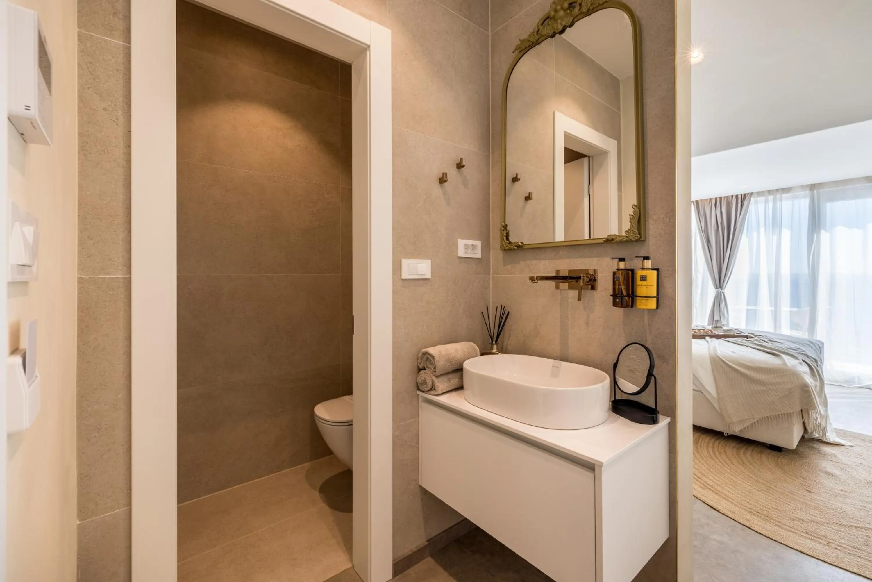 Toilet, Bed in Hotel Aria