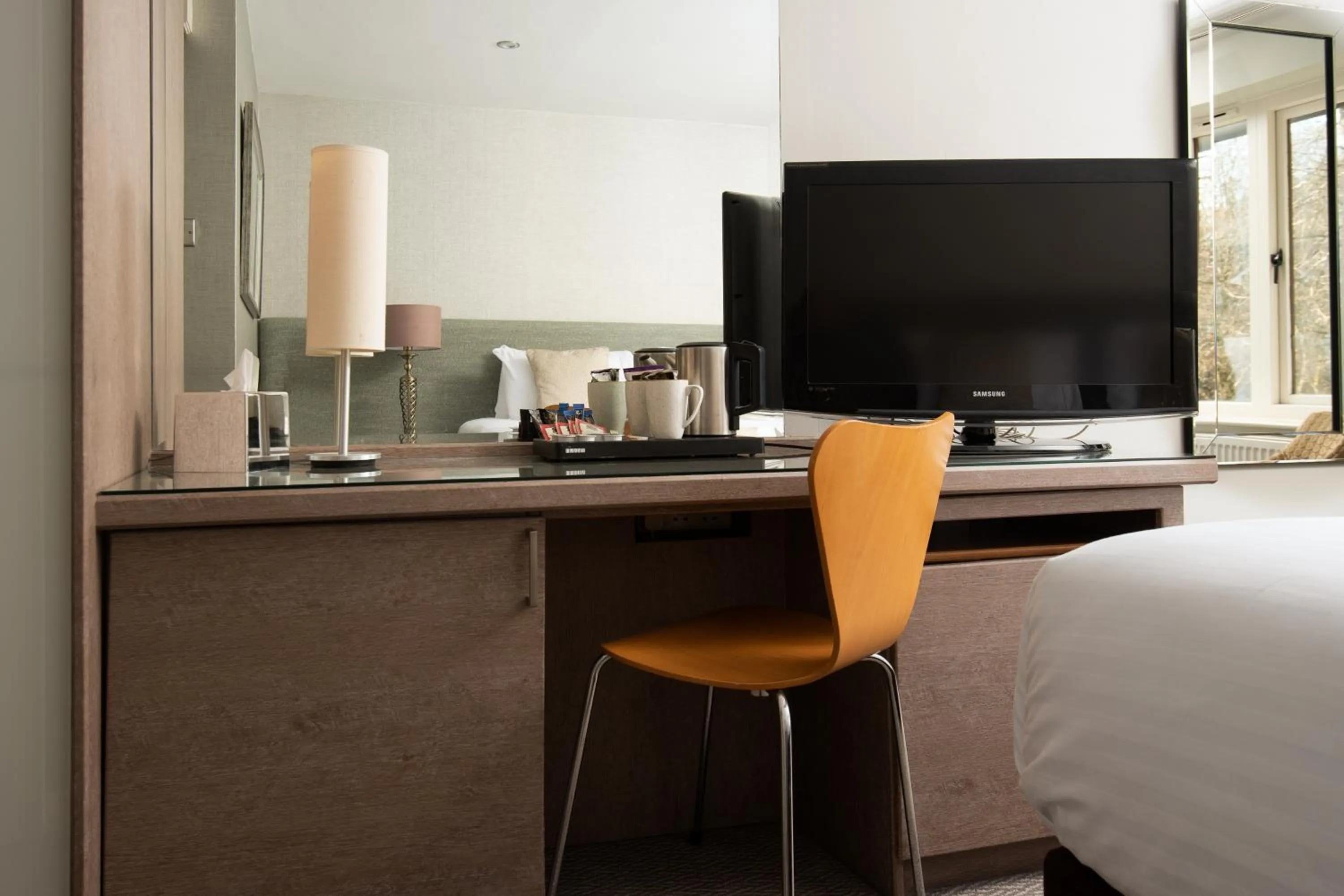 Seating area, Bed in Windermere Rooms at The Wateredge Inn