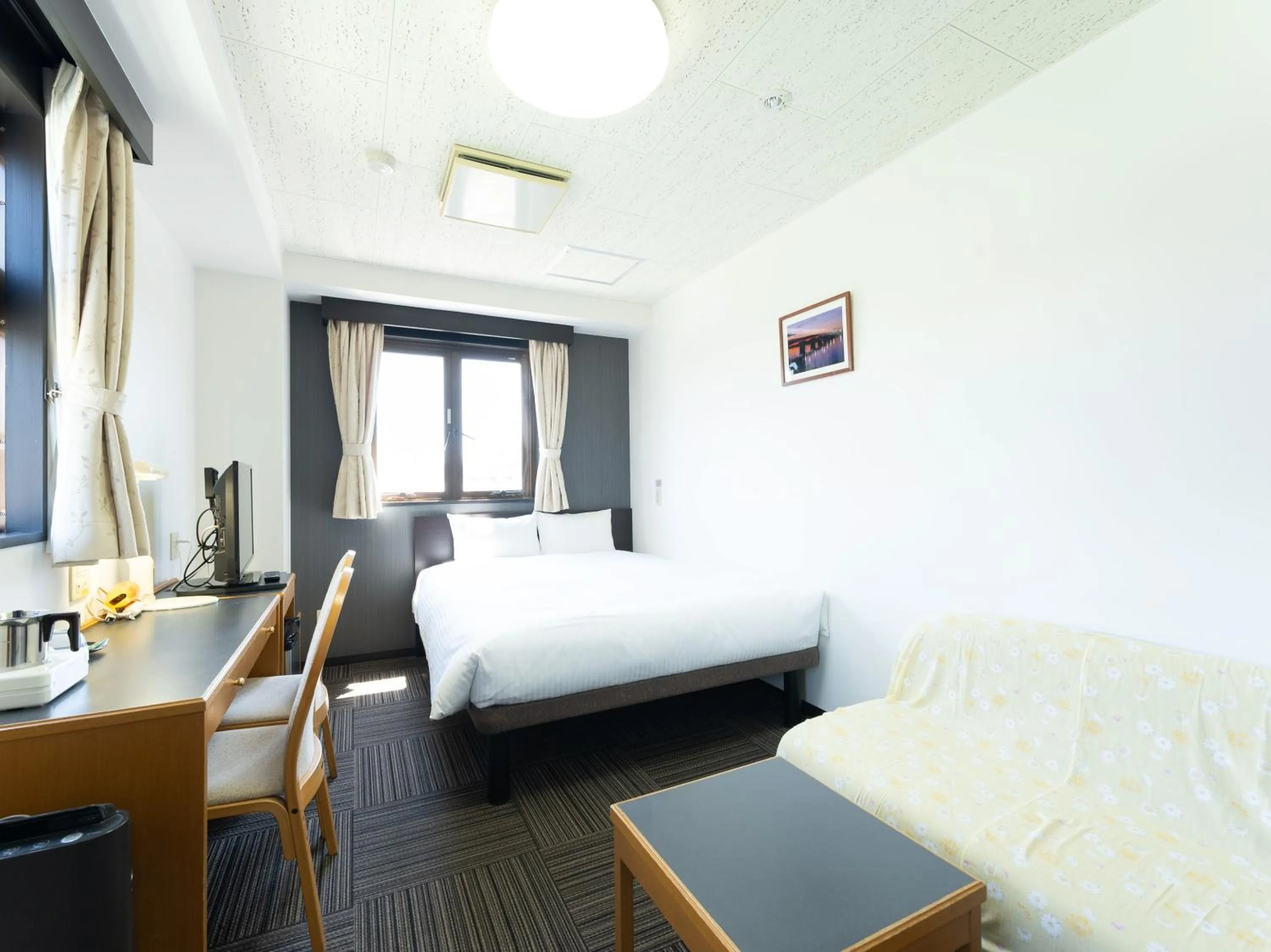 Bed in Noshiro Town Hotel Minami