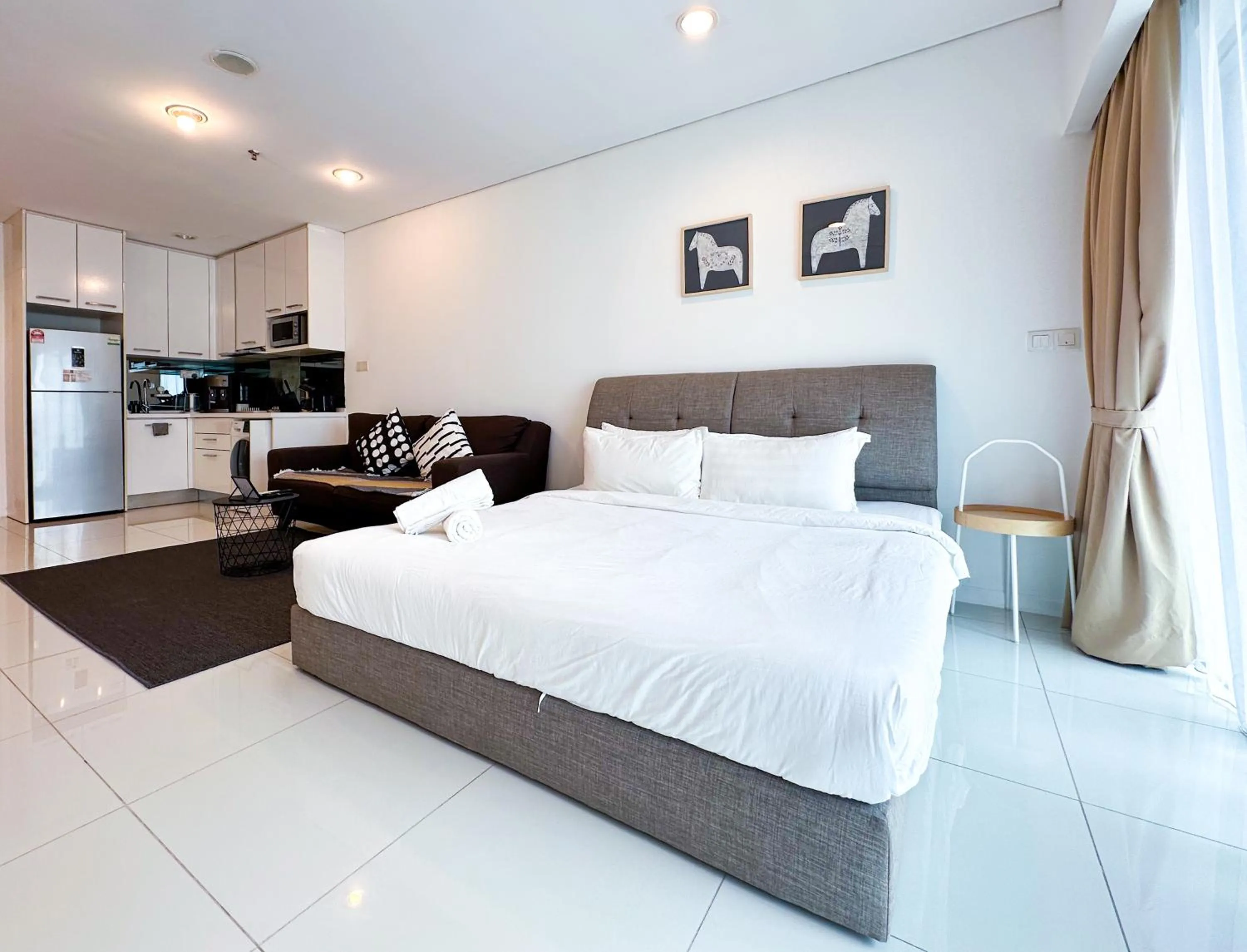 Bed in Summer Suites KLCC by apartx