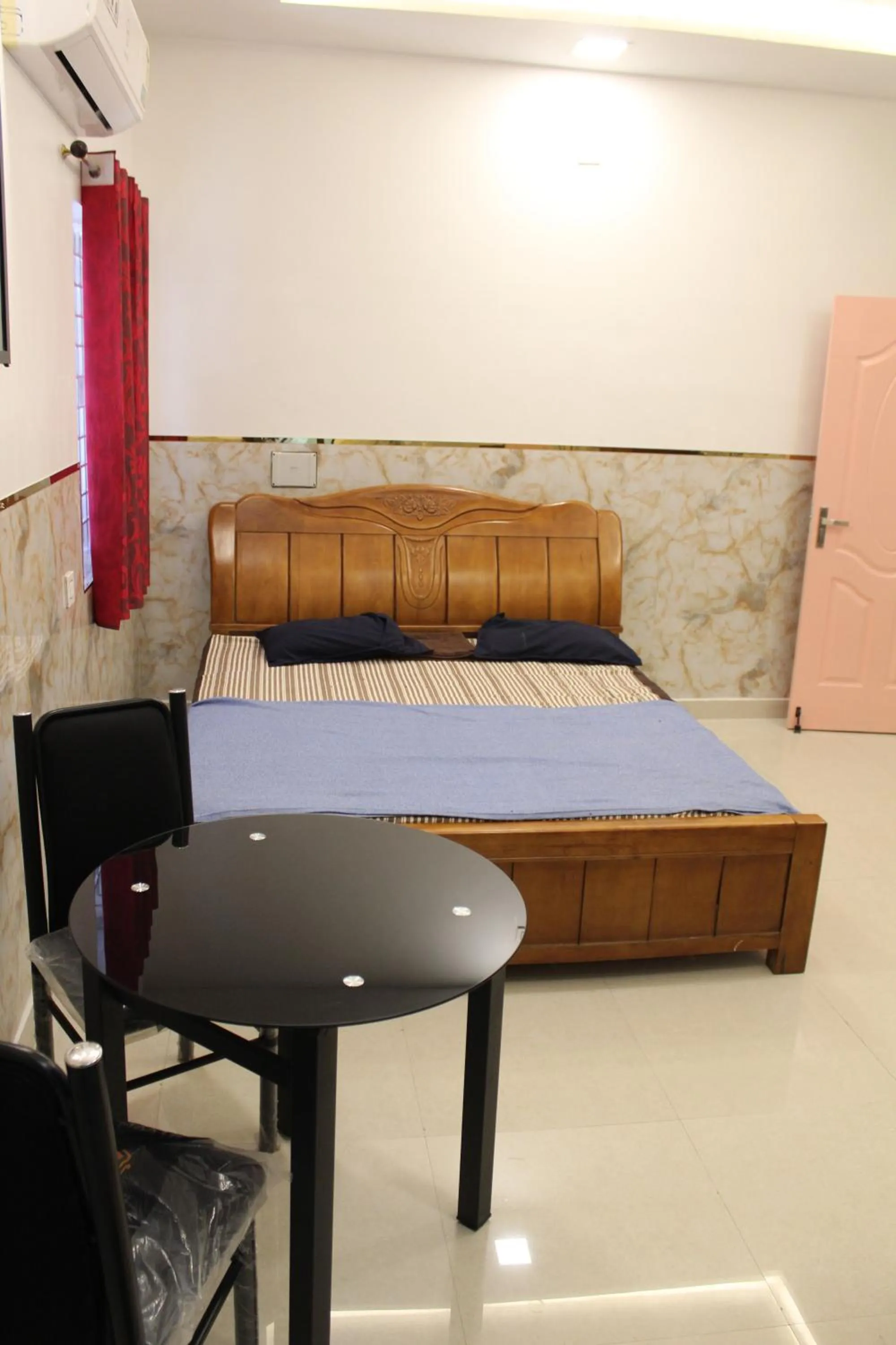 Photo of the whole room, Bed in Sree Laxmi Vilas