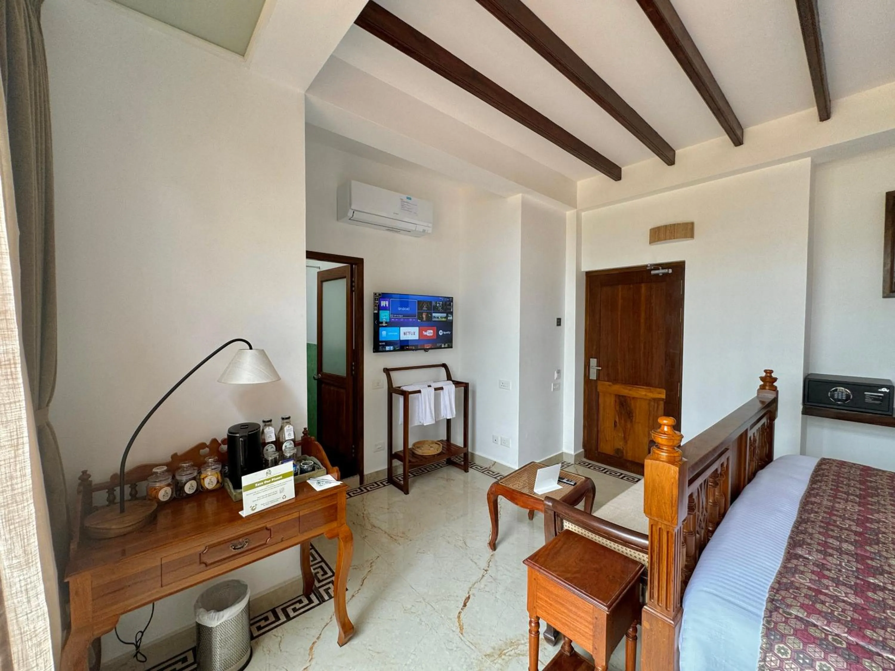 Bed in La Plage Seaview Suites