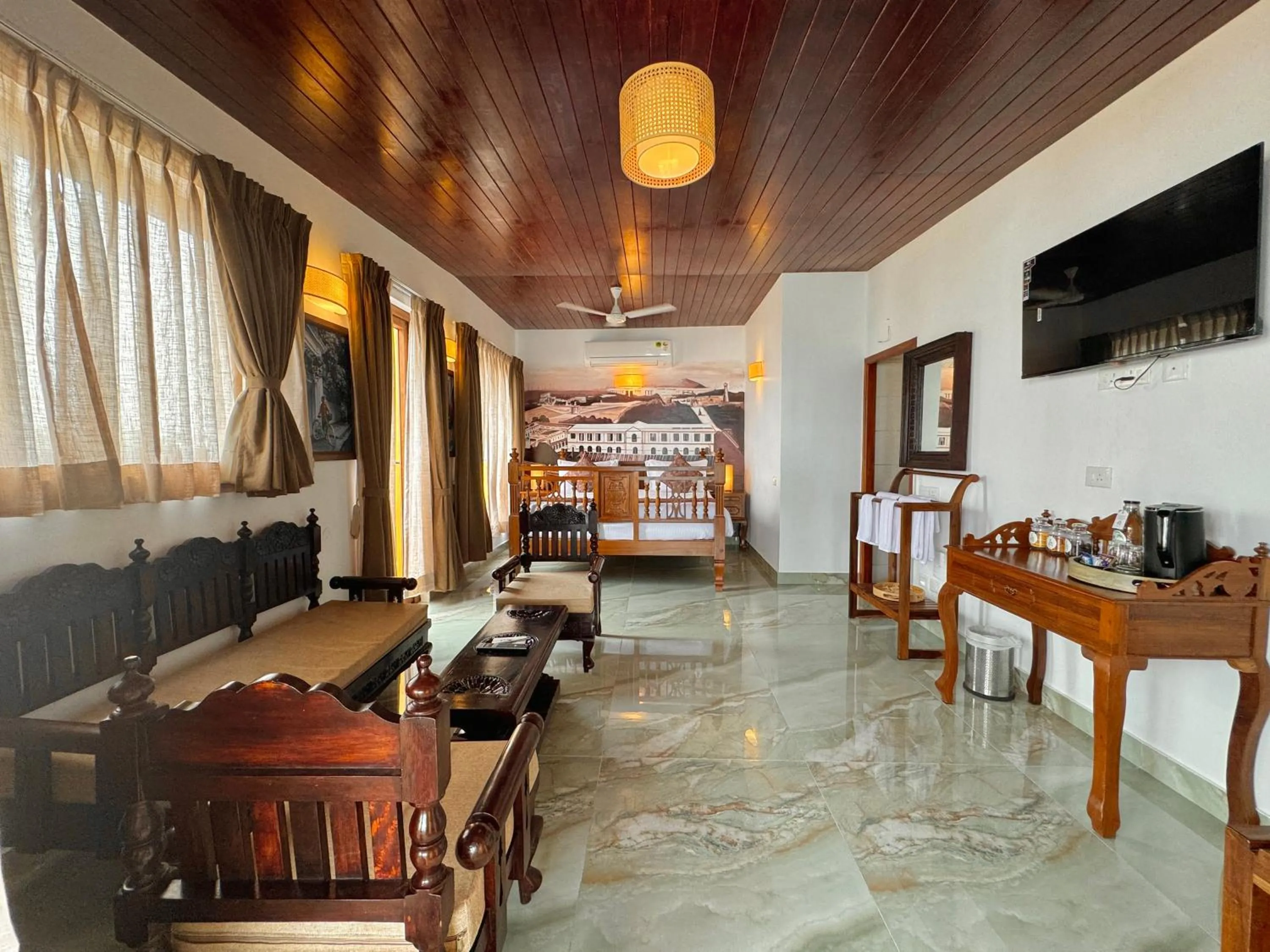 TV and multimedia in La Plage Seaview Suites