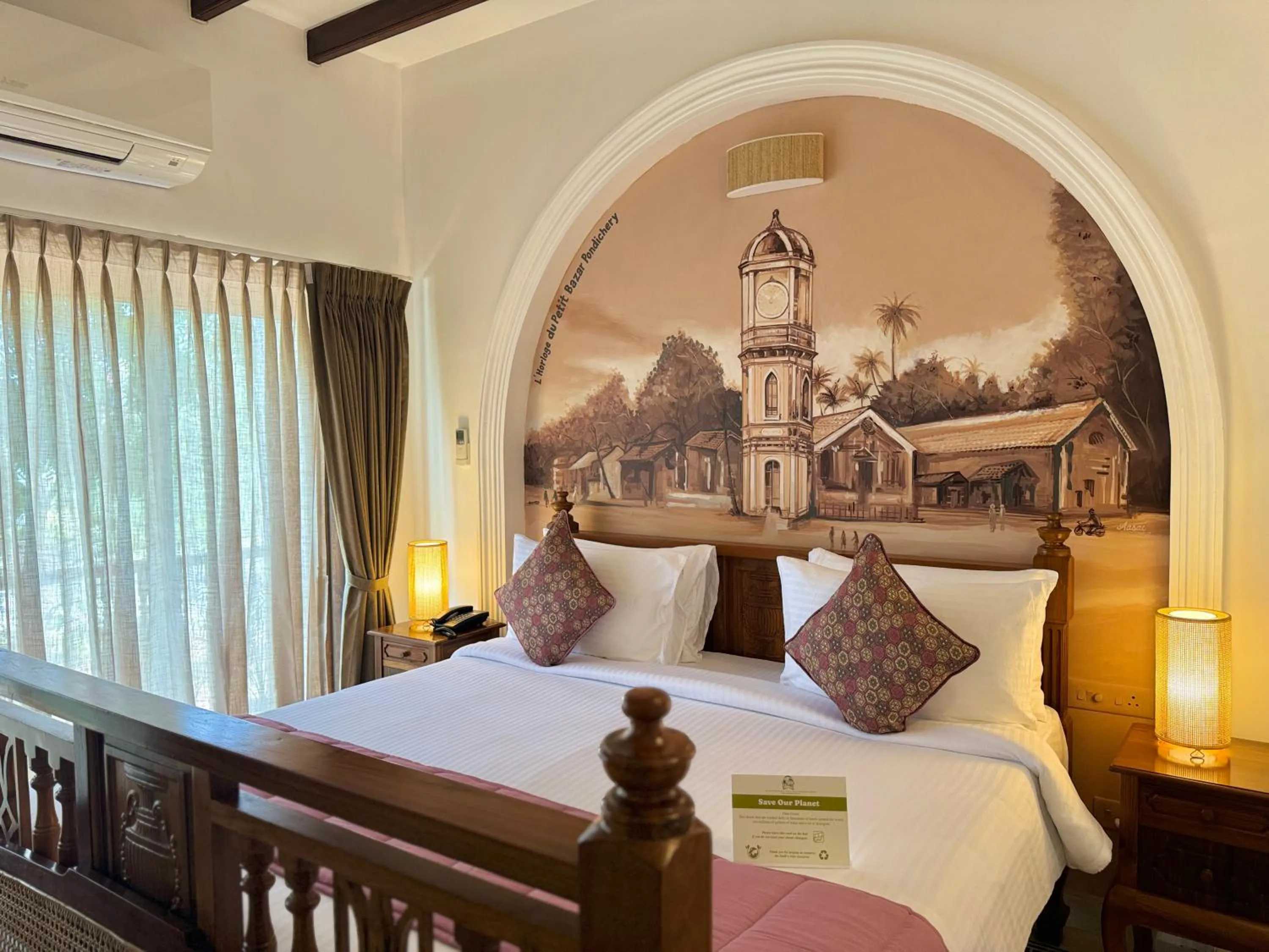 Bed in La Plage Seaview Suites