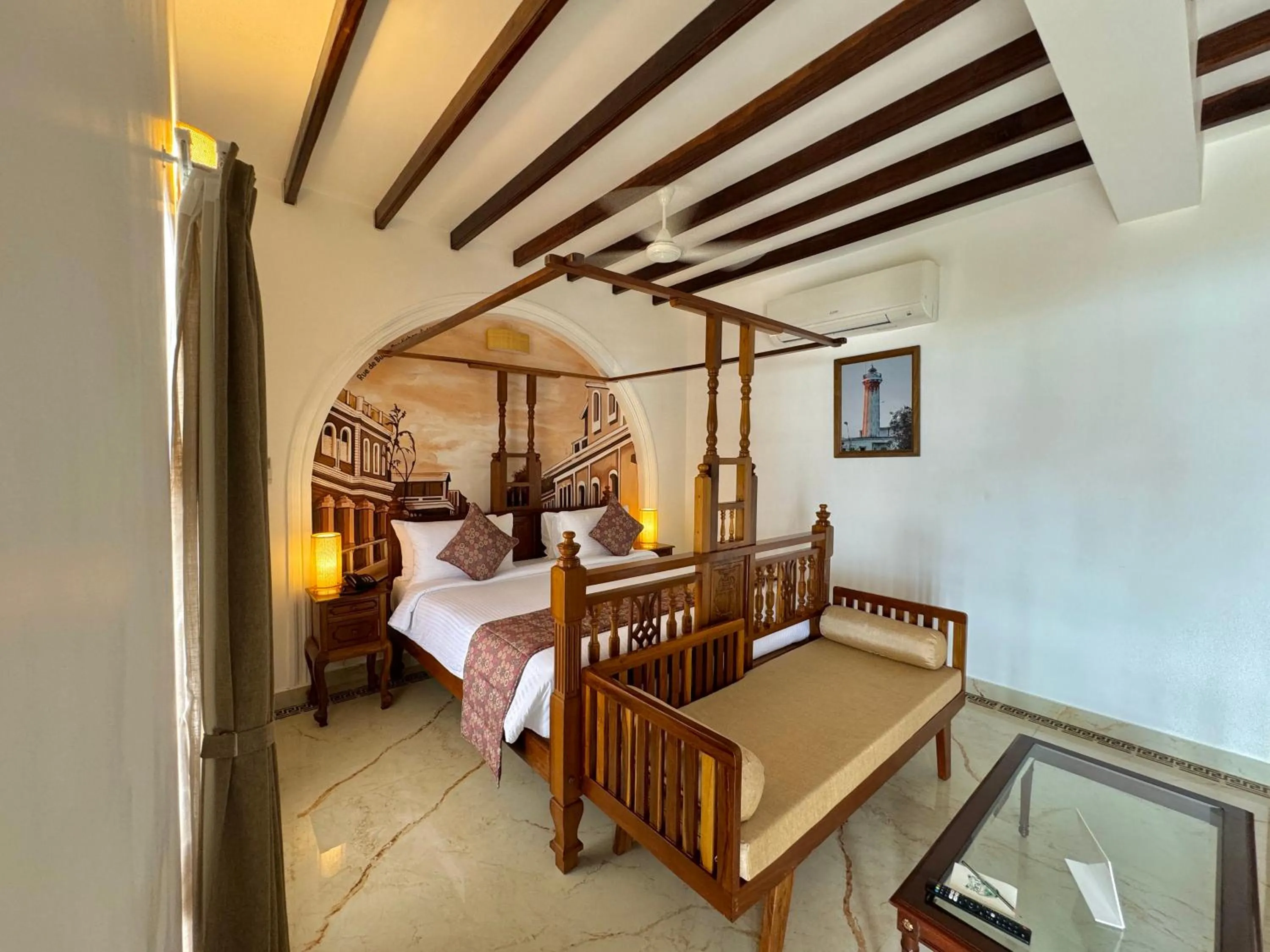 Bed in La Plage Seaview Suites