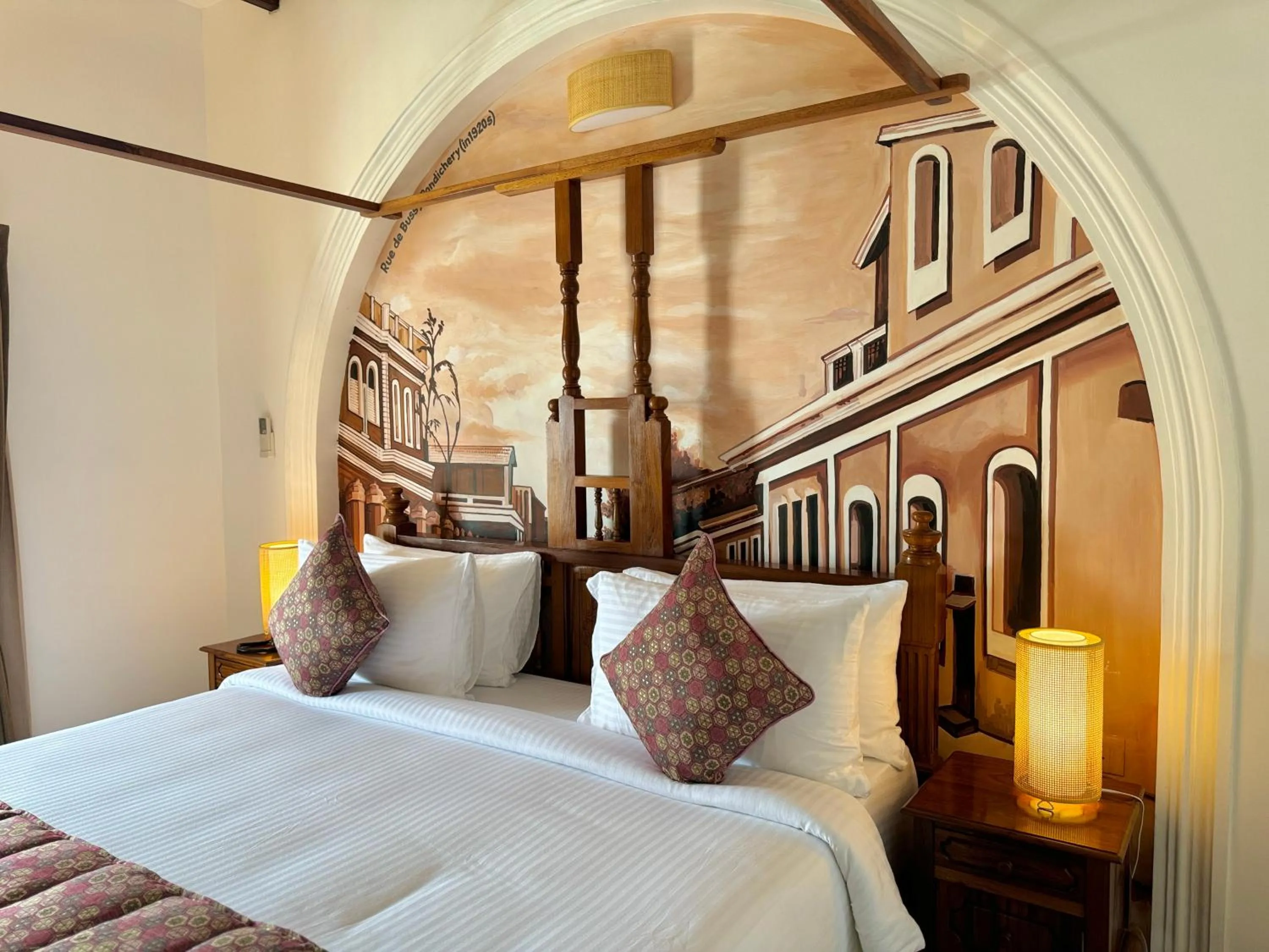 Bed in La Plage Seaview Suites