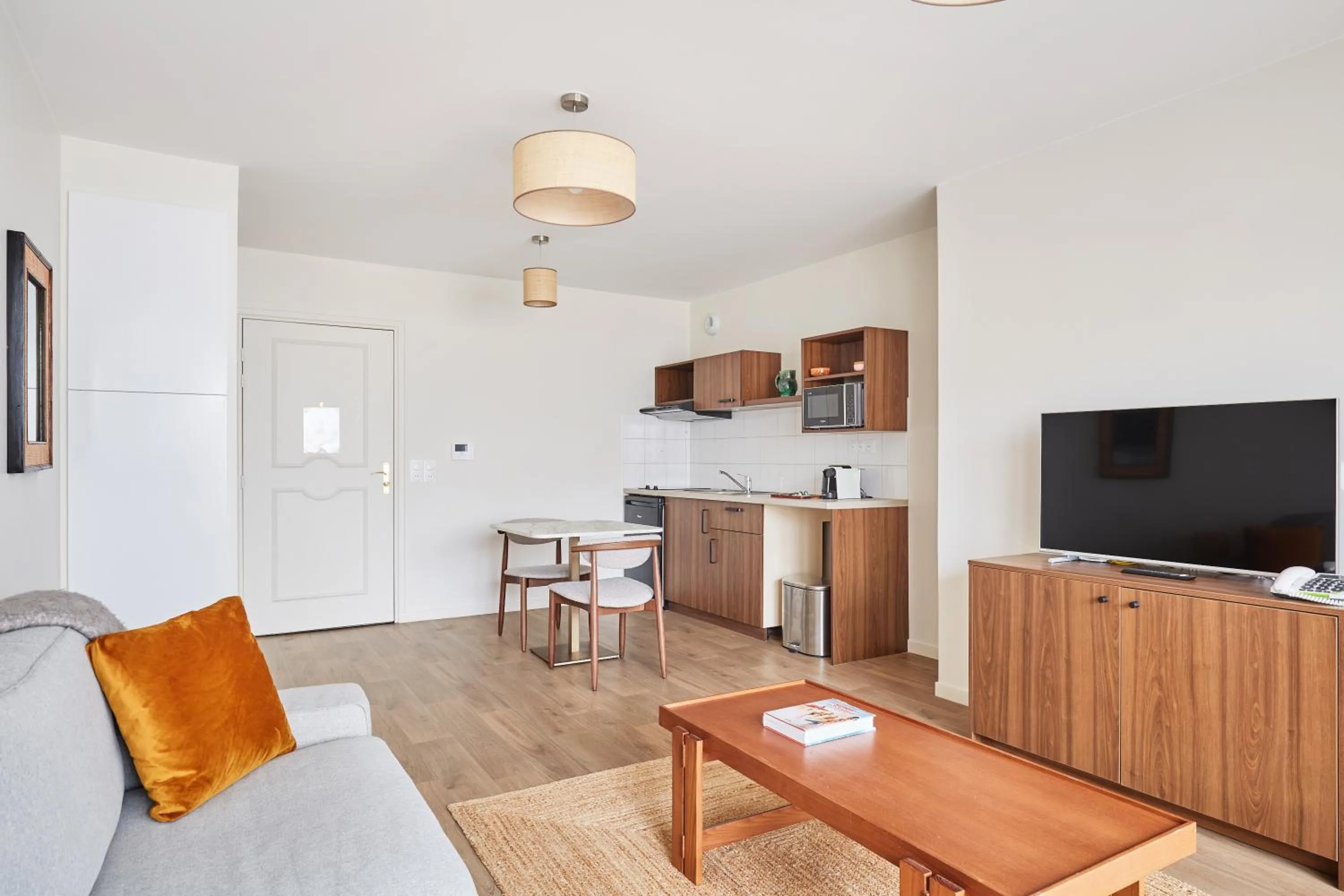 Seating area in Appart Hotel Paris Levallois Maurice Ravel