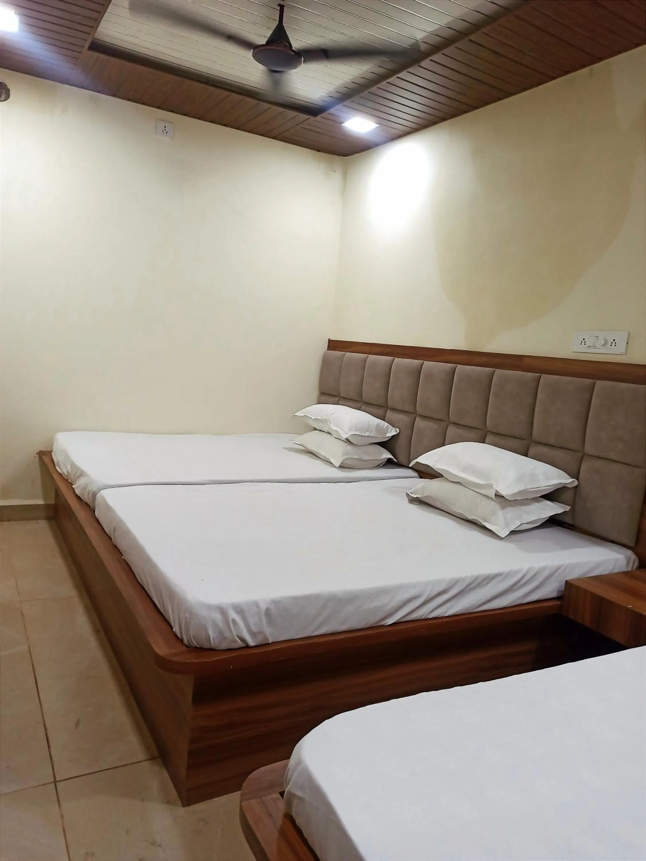 Bed in Hotel Yuvan Palace