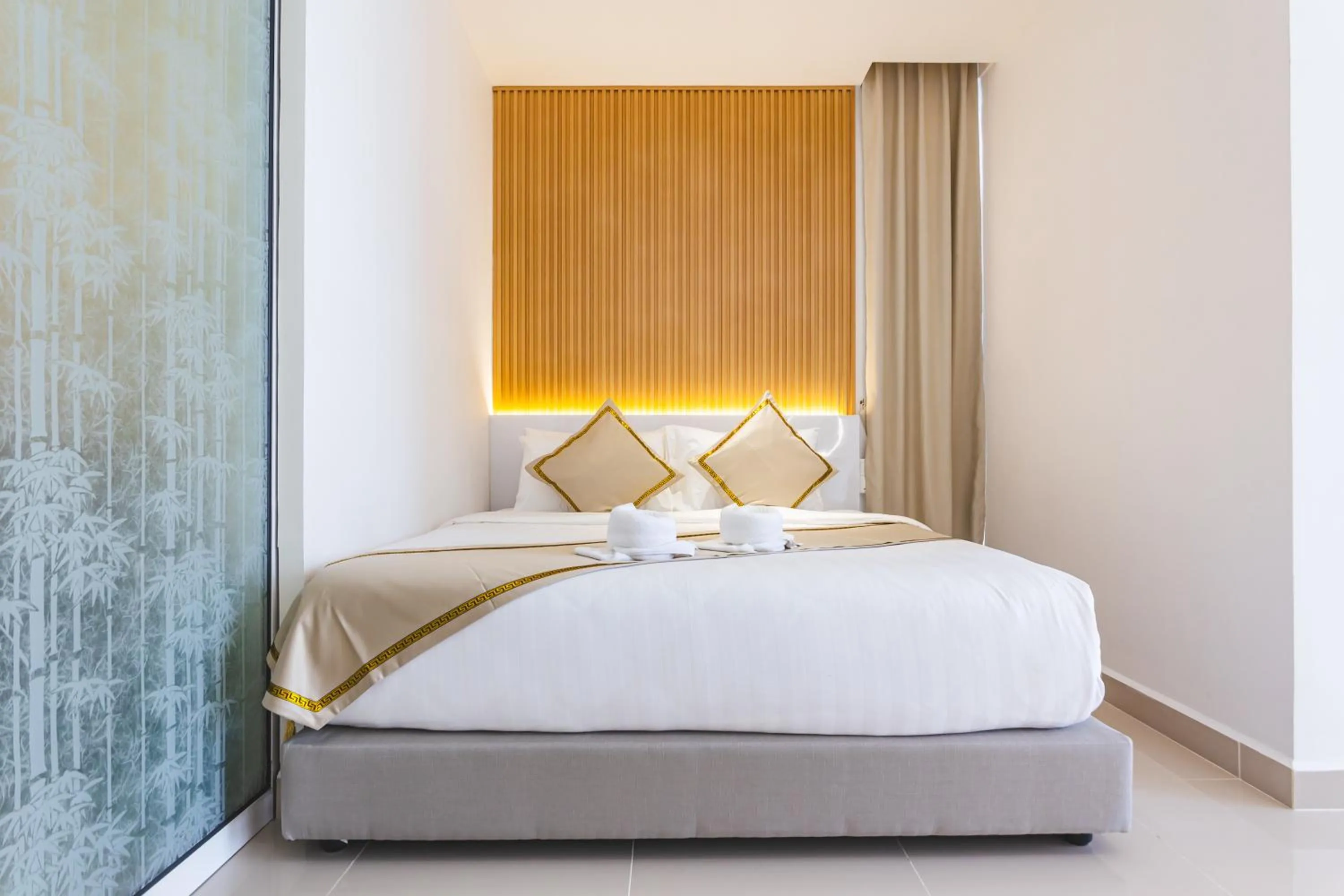 Bed in Beautiful Seaview Suites at The Shore Kota Kinabalu