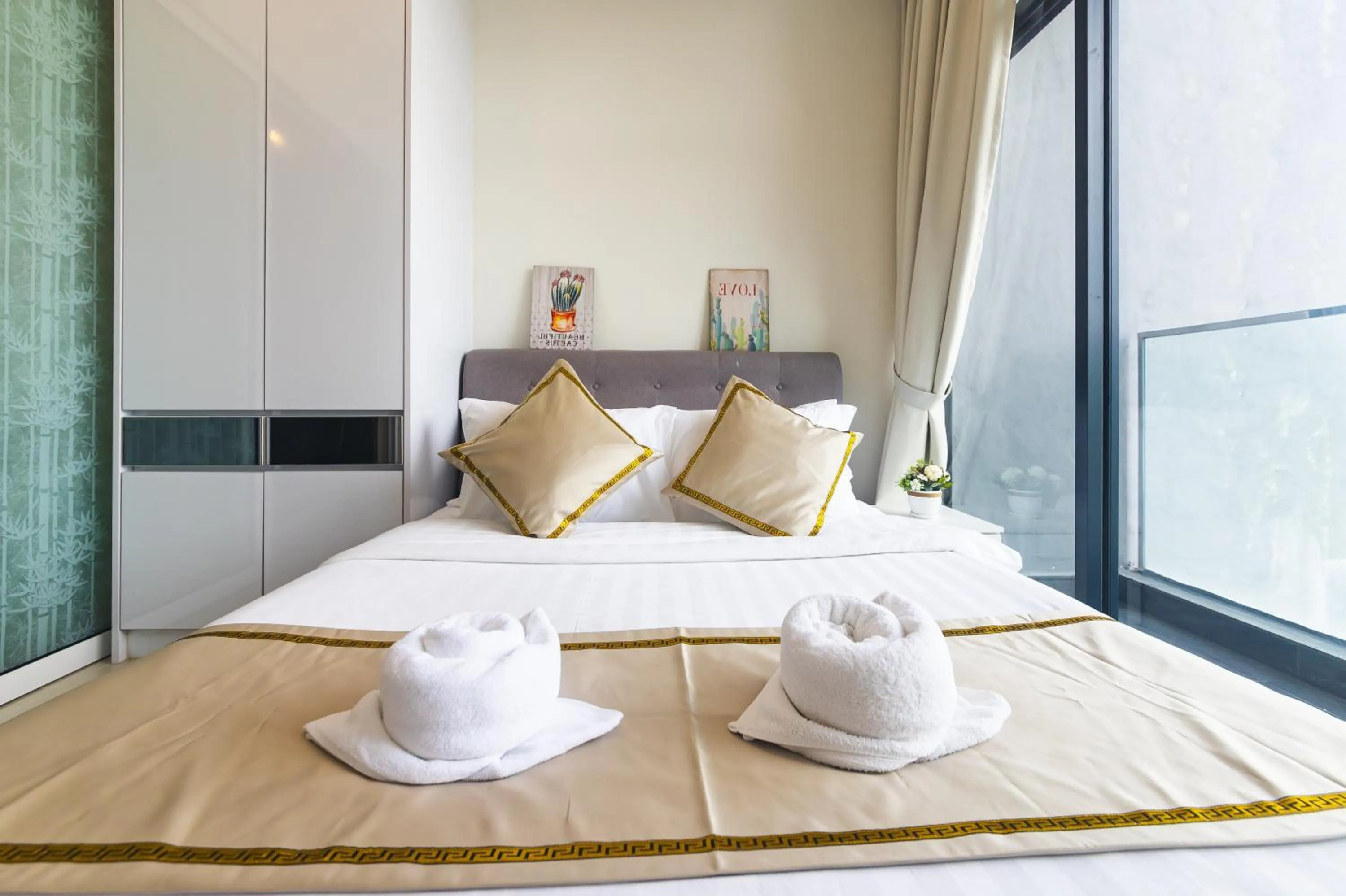 Bed in Beautiful Seaview Suites at The Shore Kota Kinabalu